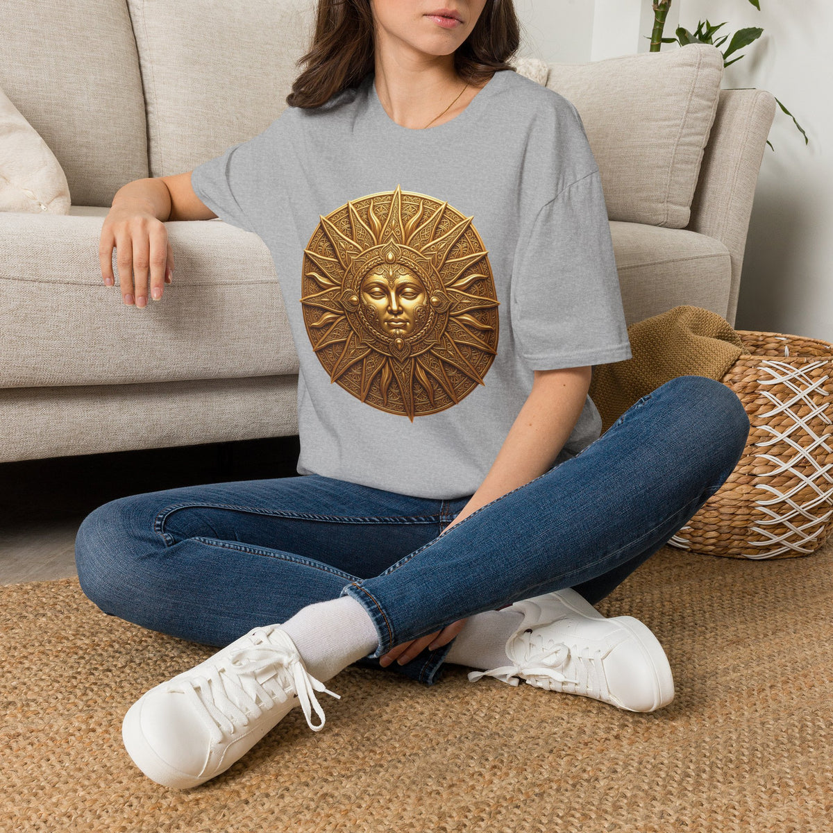 Sport gray T-shirt with gold sun-face medallion graphic on the chest
