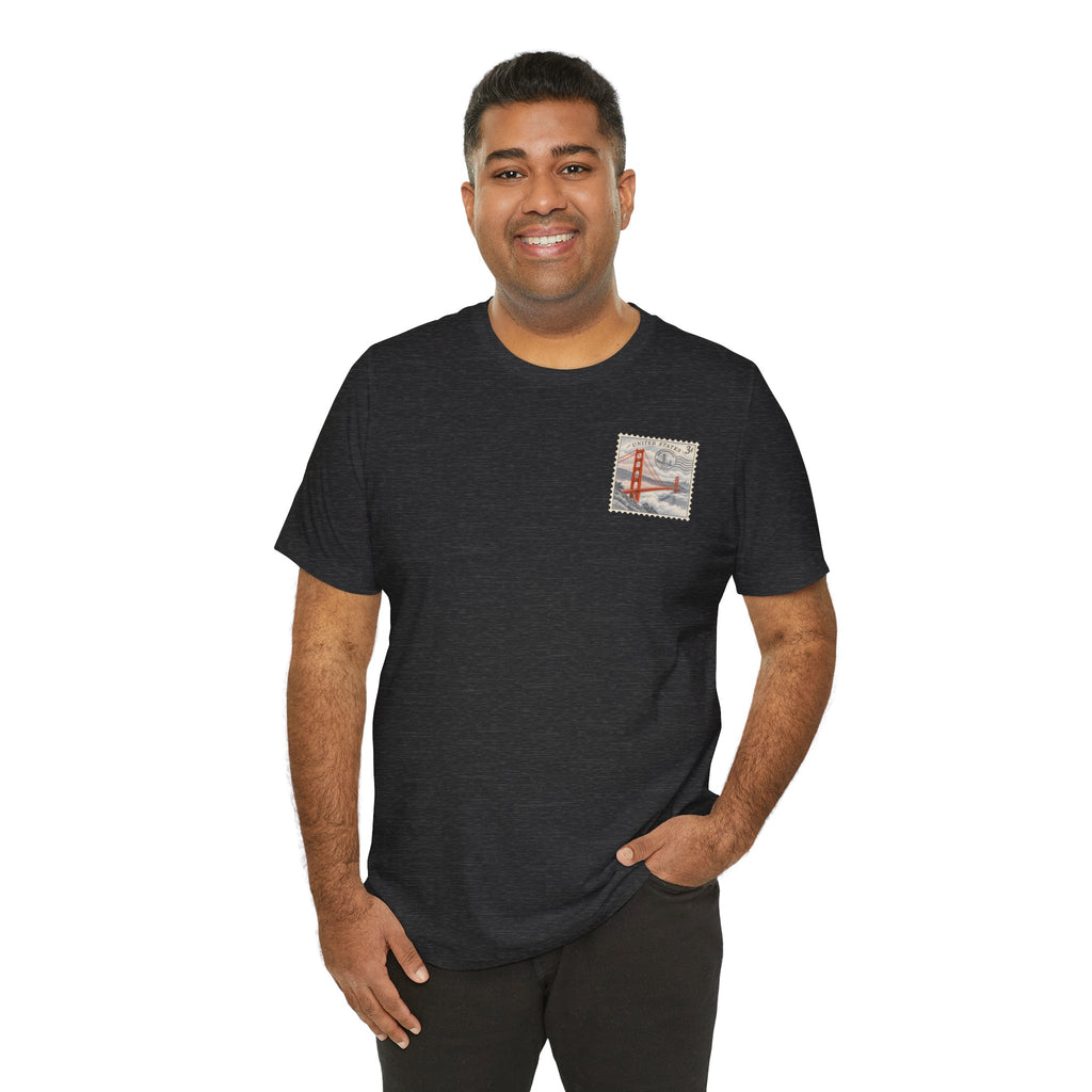 Dark gray T-shirt worn by a person, featuring a small Golden Gate Bridge chest graphic