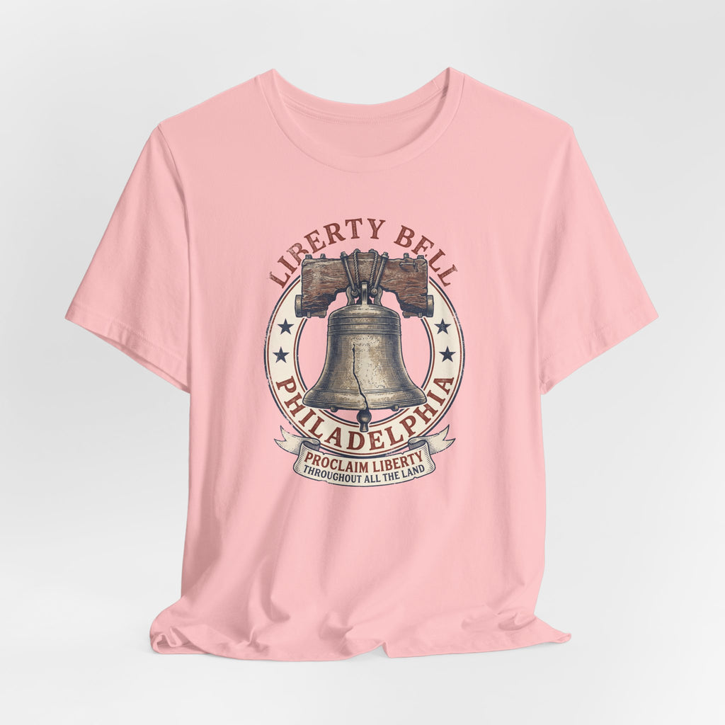Pink crewneck T-shirt with Liberty Bell Philadelphia emblem chest print.