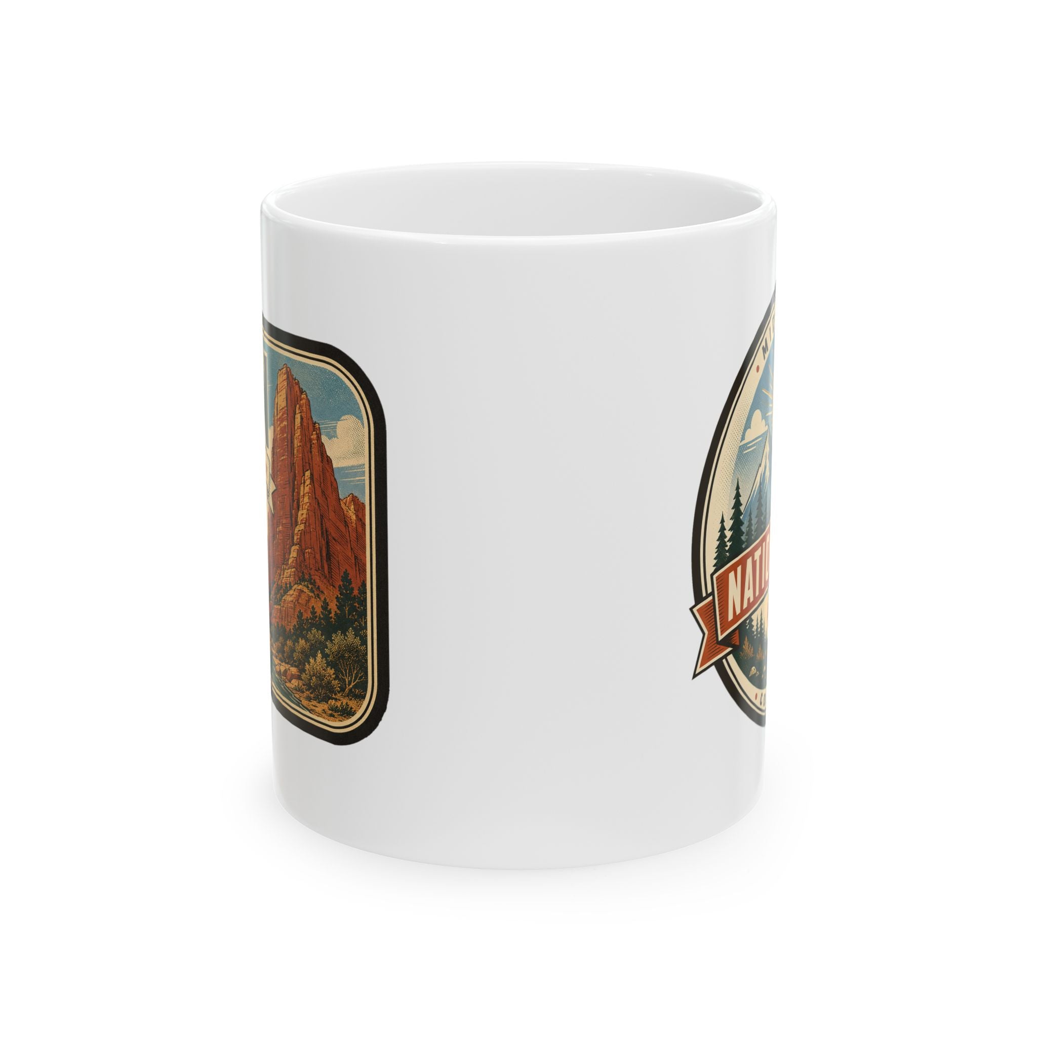 White ceramic mug with landscape panel graphic and partial side badge