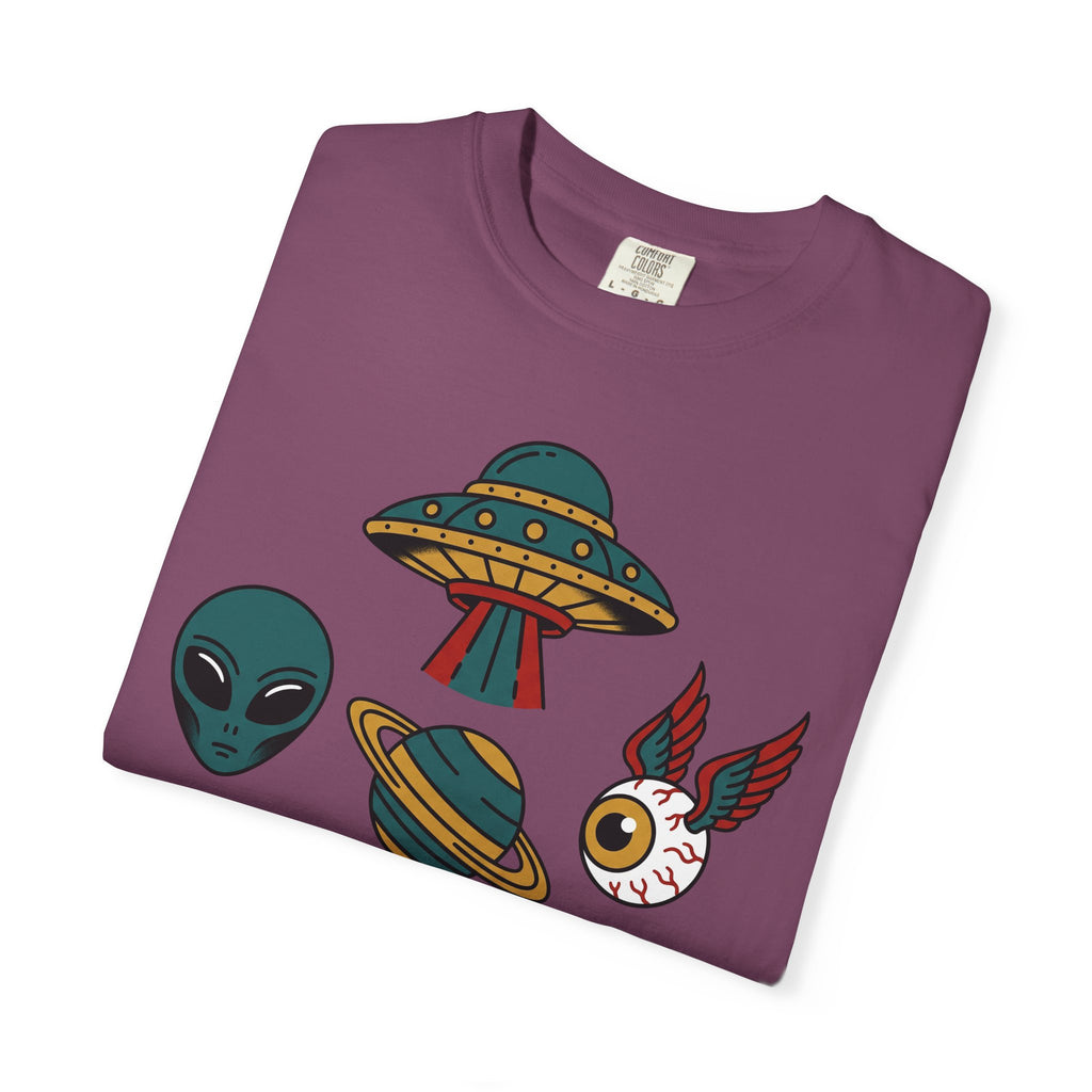Dark purple T-shirt close-up: UFO, alien, and cat graphic