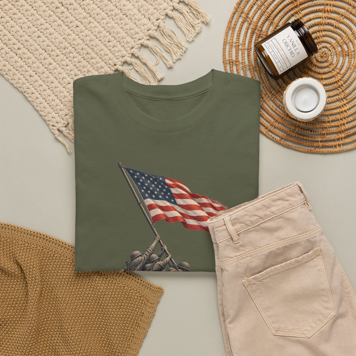 Olive green T-shirt with U.S. flag on pole graphic in front