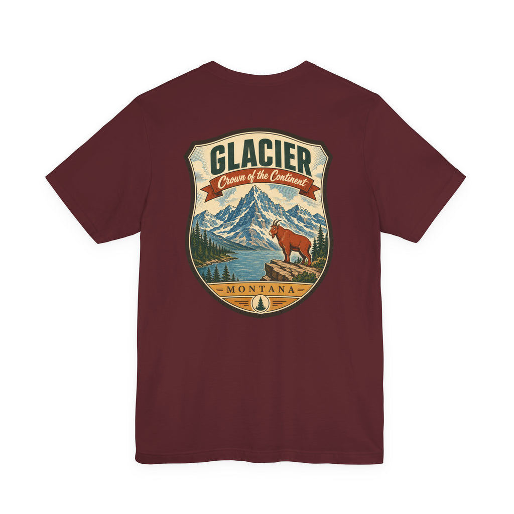 Burgundy crewneck t-shirt with Glacier Montana badge graphic featuring mountains and bear.