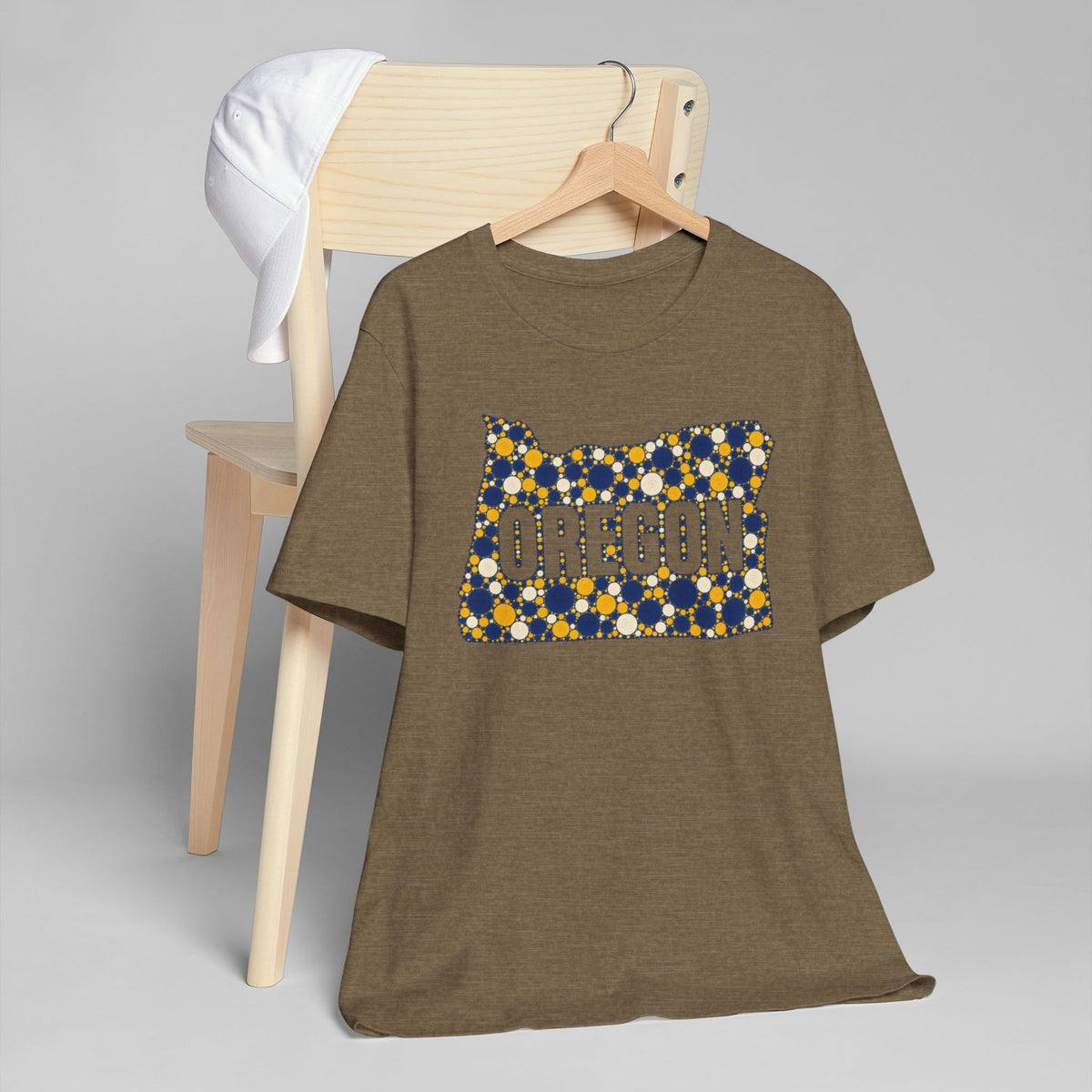 Brown short-sleeve T-shirt with Oregon polka dot graphic front