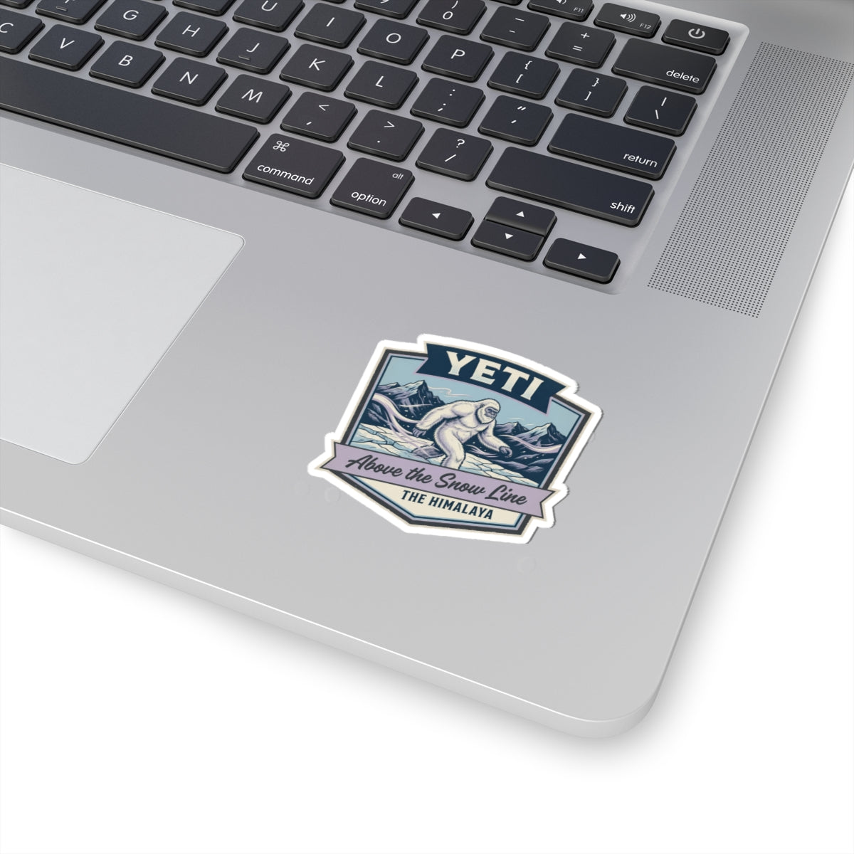 Die-cut Yeti sticker with Himalayan Sasquatch graphic and snowline text, white border