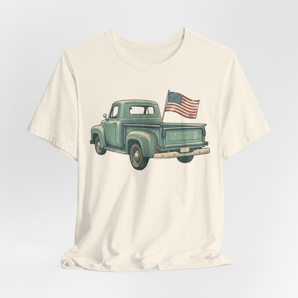 Cream T-shirt with green vintage pickup truck and U.S. flag graphic on front