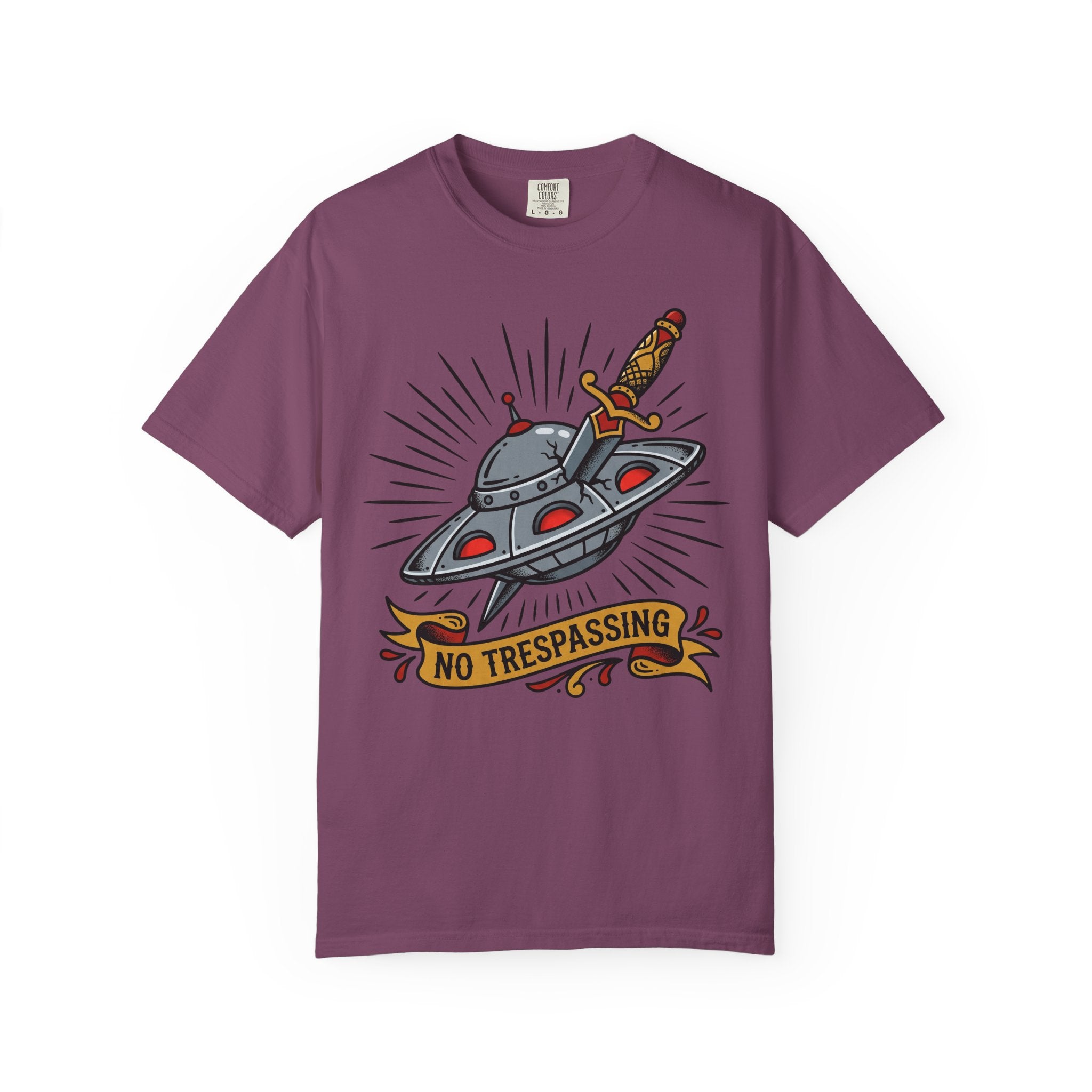 Purple graphic T-shirt with UFO and dagger “No Trespassing” print