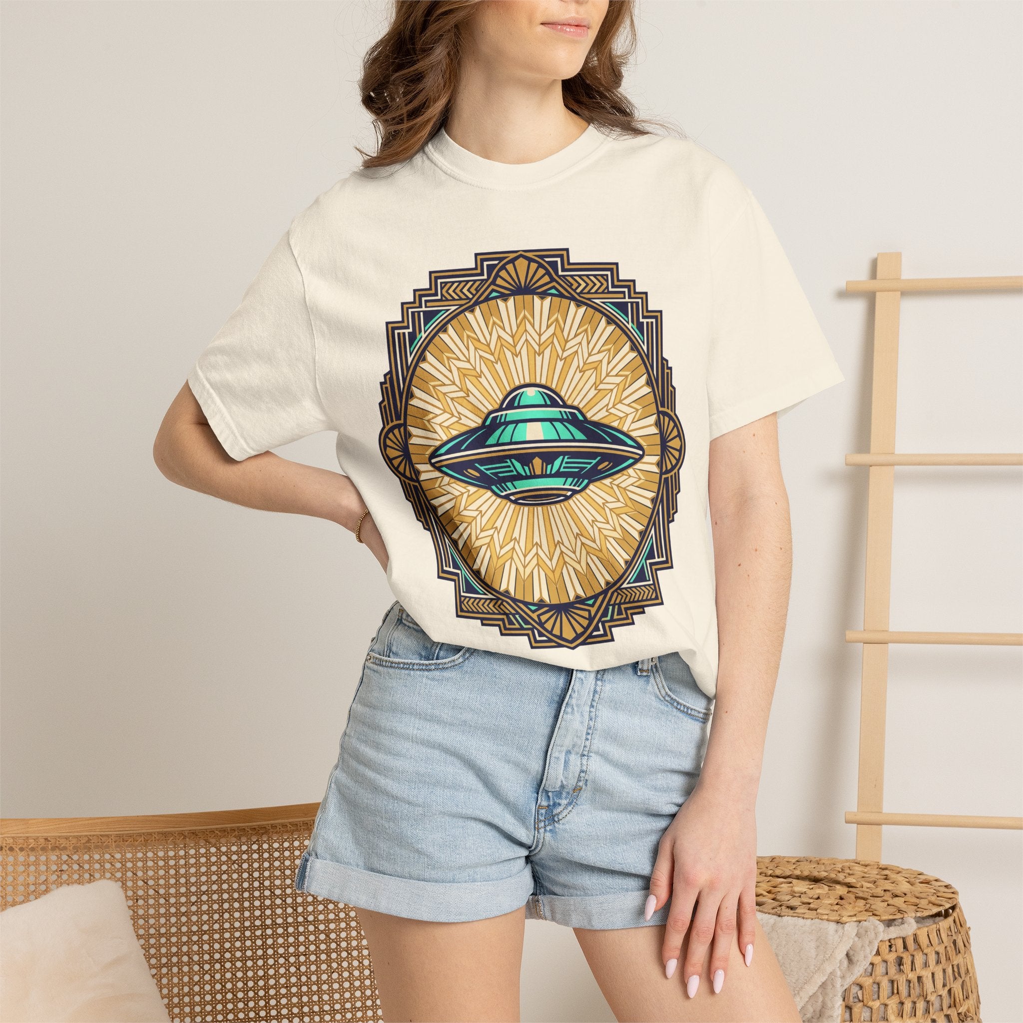 Cream t-shirt with retro flying saucer sunburst graphic on front