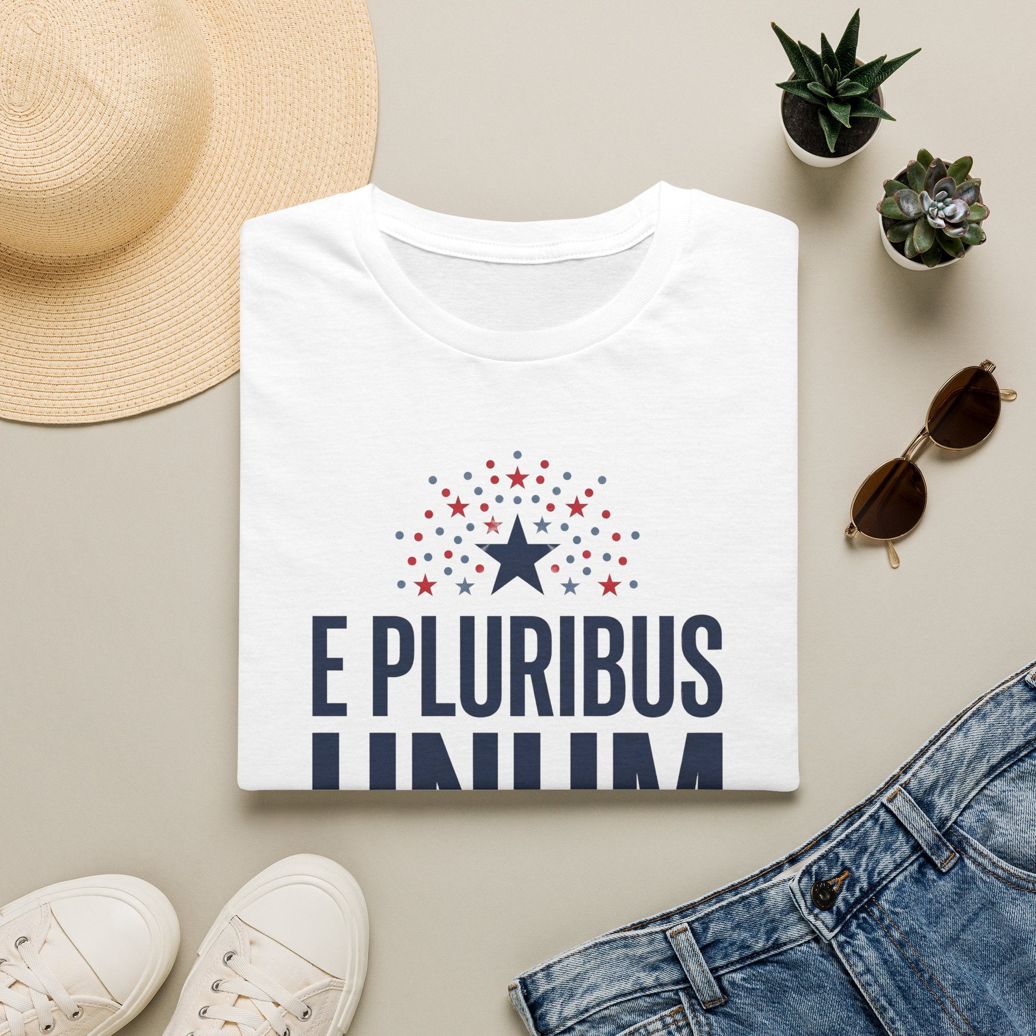 White patriotic graphic T-shirt, crew neck; starburst and 'E Pluribus Unum' text