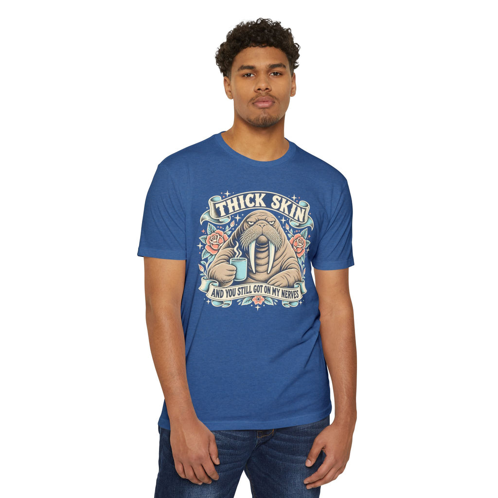 Light blue crew-neck graphic T-shirt with walrus illustration and “Thick Skin” text