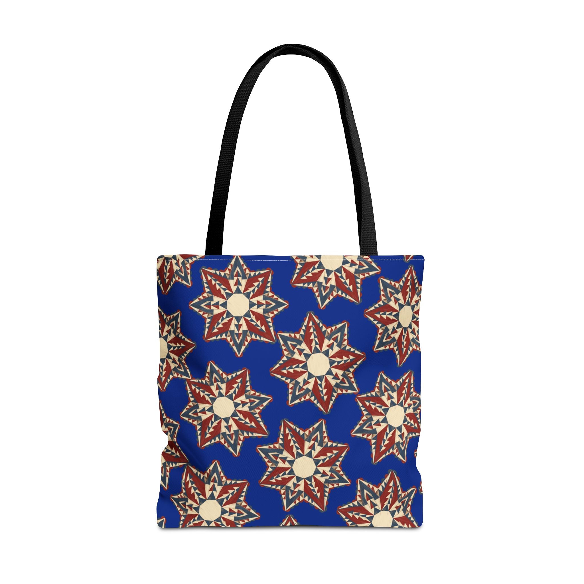 Blue tote bag with starburst floral pattern and black shoulder straps