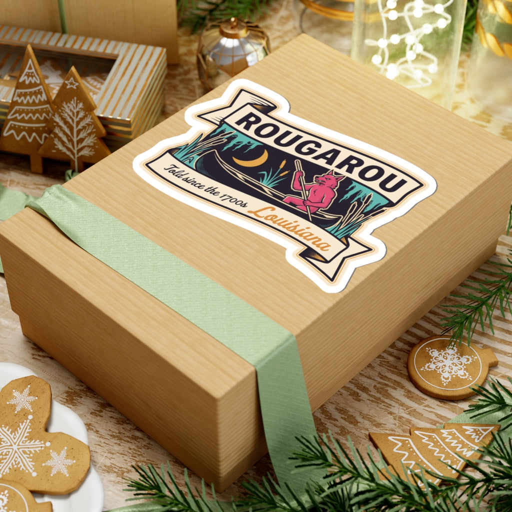 Rougarou bayou canoe sticker on a gift box with red creature and Louisiana ribbon