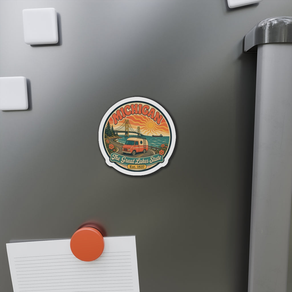 Round Michigan camper magnet on a stainless refrigerator door