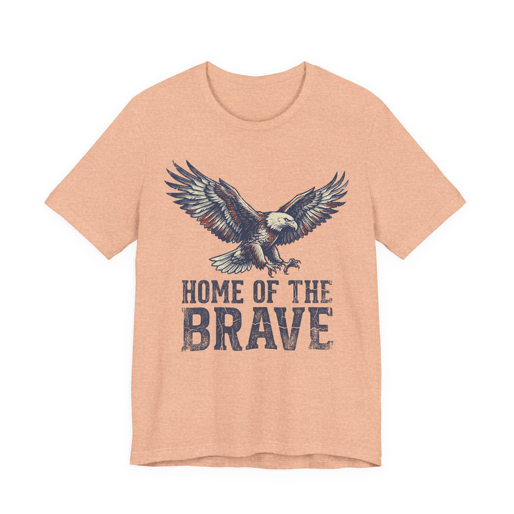 Peach T-shirt with bald eagle graphic and “Home of the Brave” text