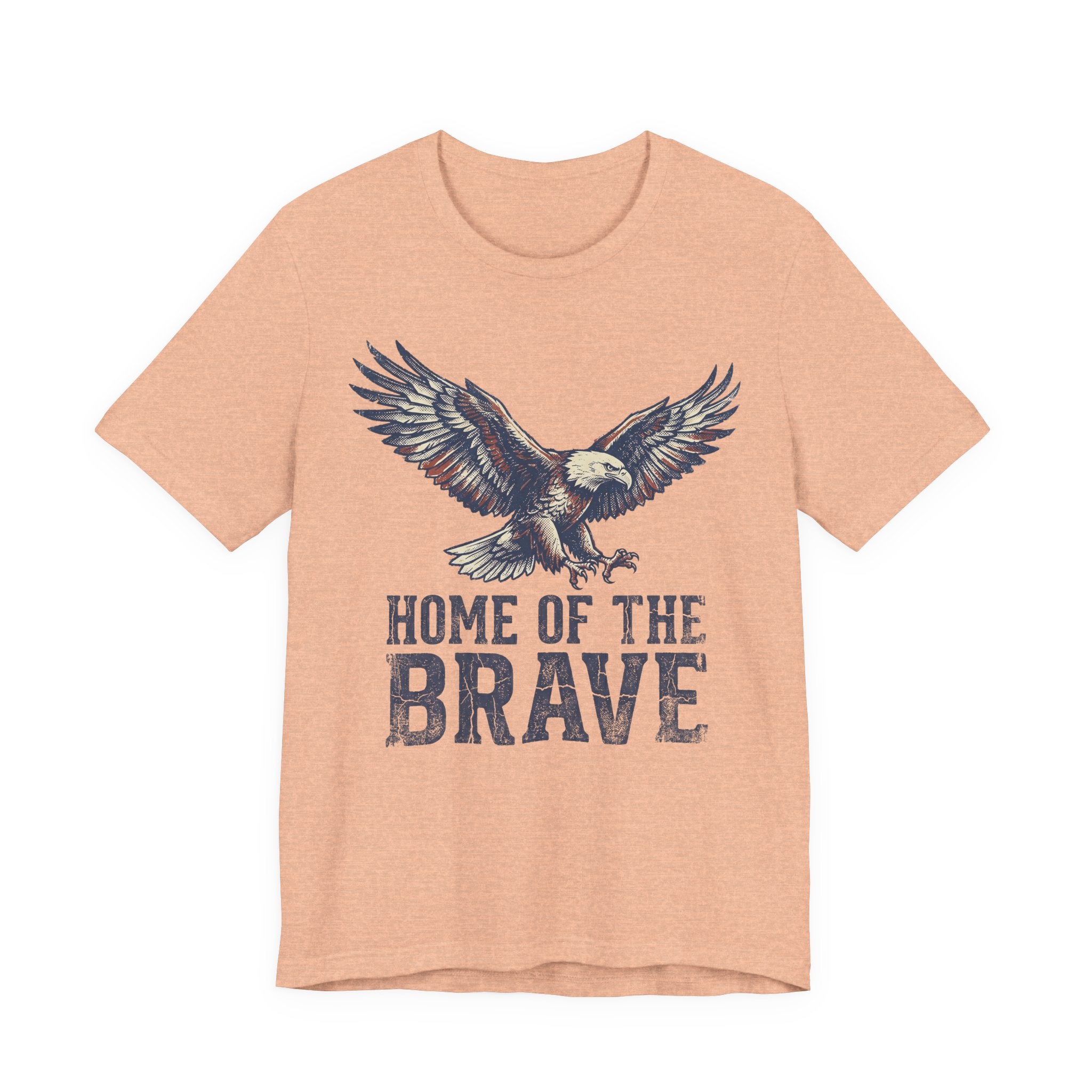 Peach T-shirt with bald eagle graphic and “Home of the Brave” text