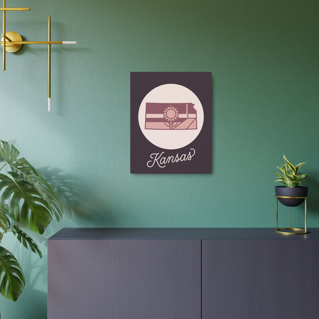 Charcoal metal wall sign with circular Kansas emblem and sunrise graphic, centered
