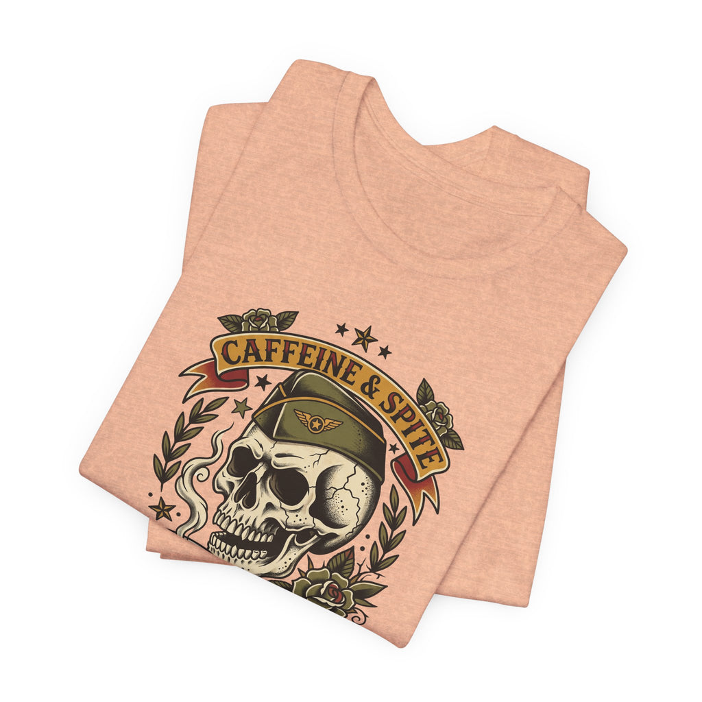 Salmon T-shirt with skull, coffee cup, and “Caffeine & Spite” graphic