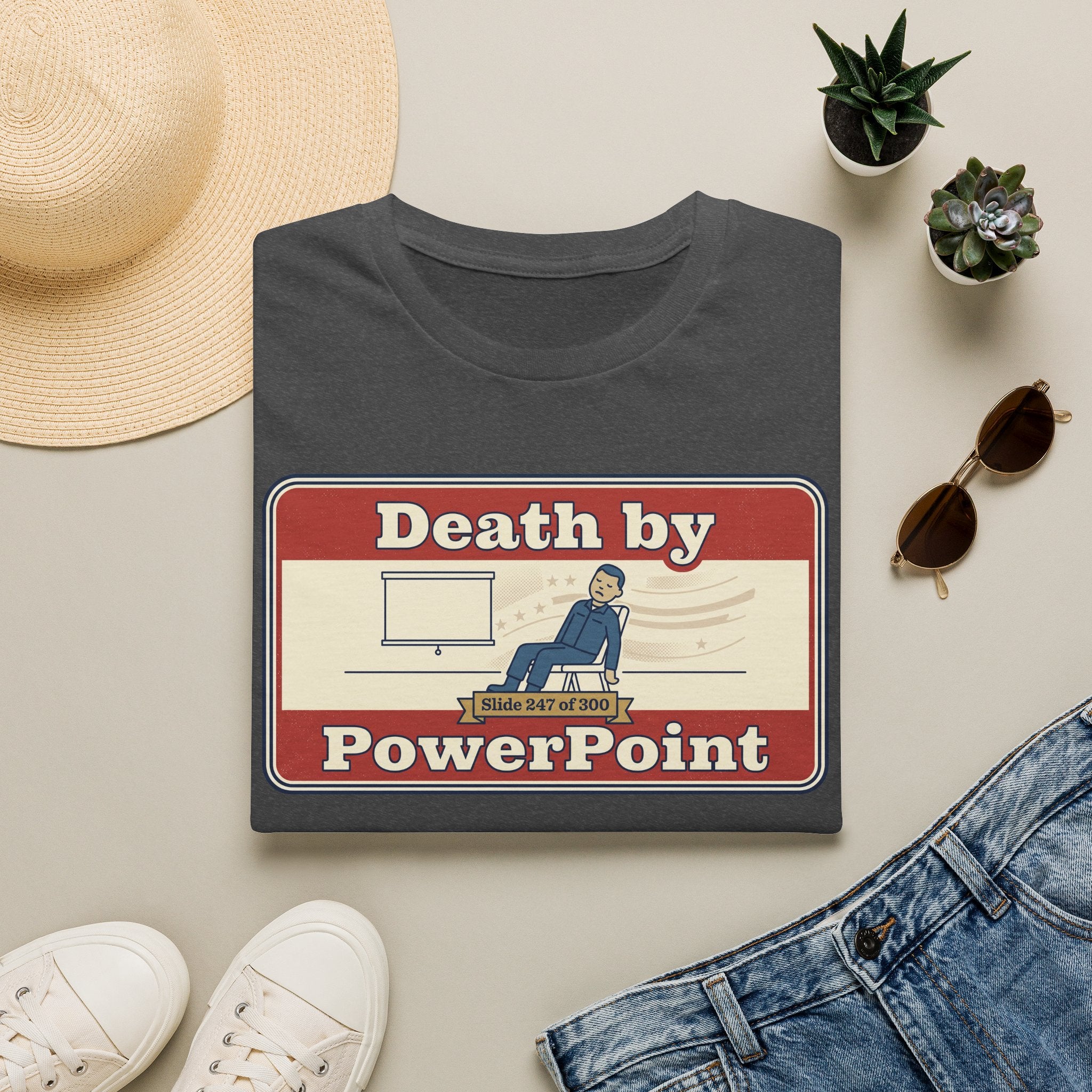 Dark gray T-shirt with 'Death by PowerPoint' presentation graphic, crew neck.