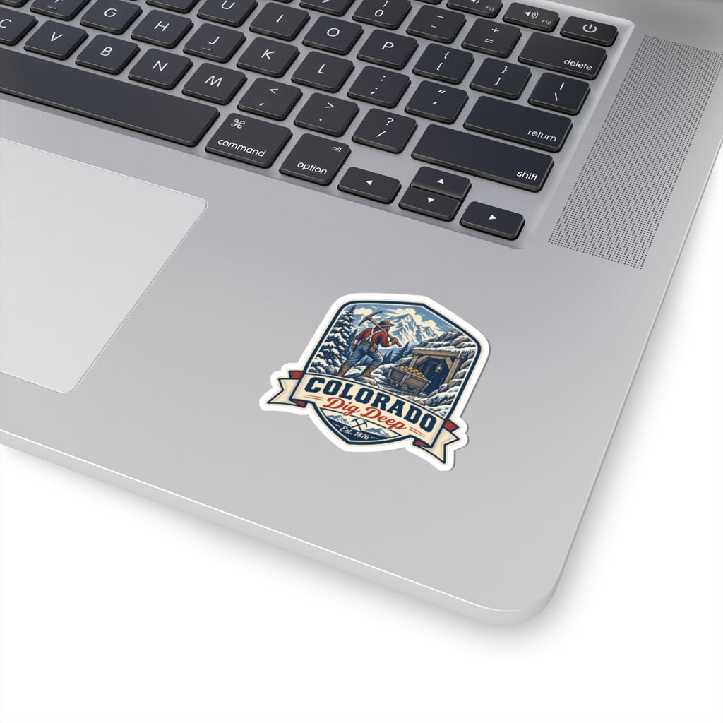 Colorado mining badge sticker with blue mountain scene, die-cut on white background