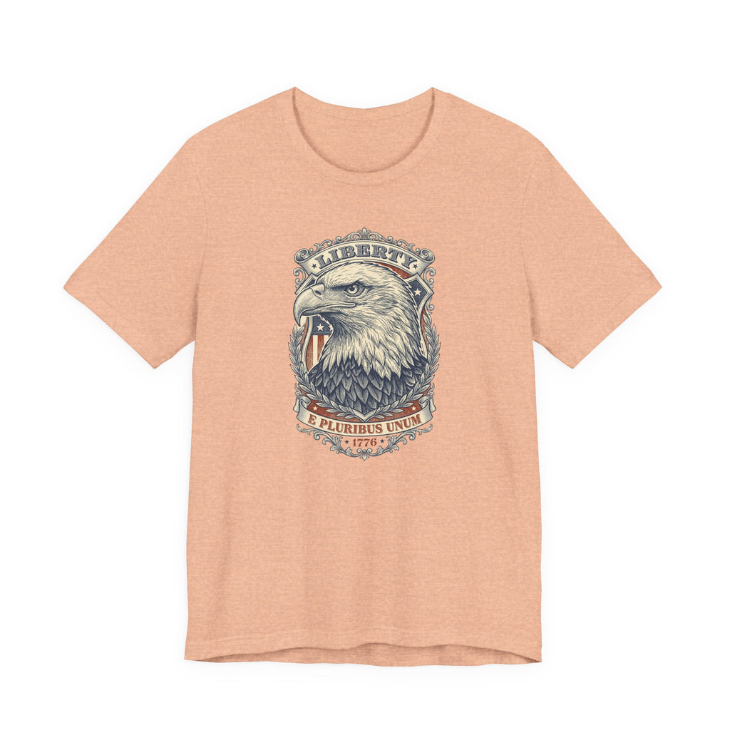 Eagle graphic tee in coral with Liberty badge and bald eagle head print