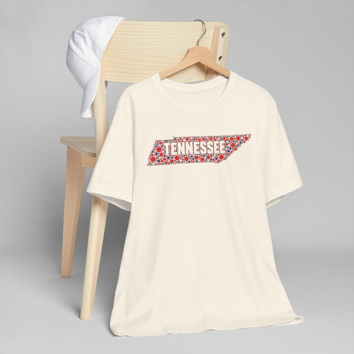 Cream T-shirt with red floral Tennessee outline graphic on chest