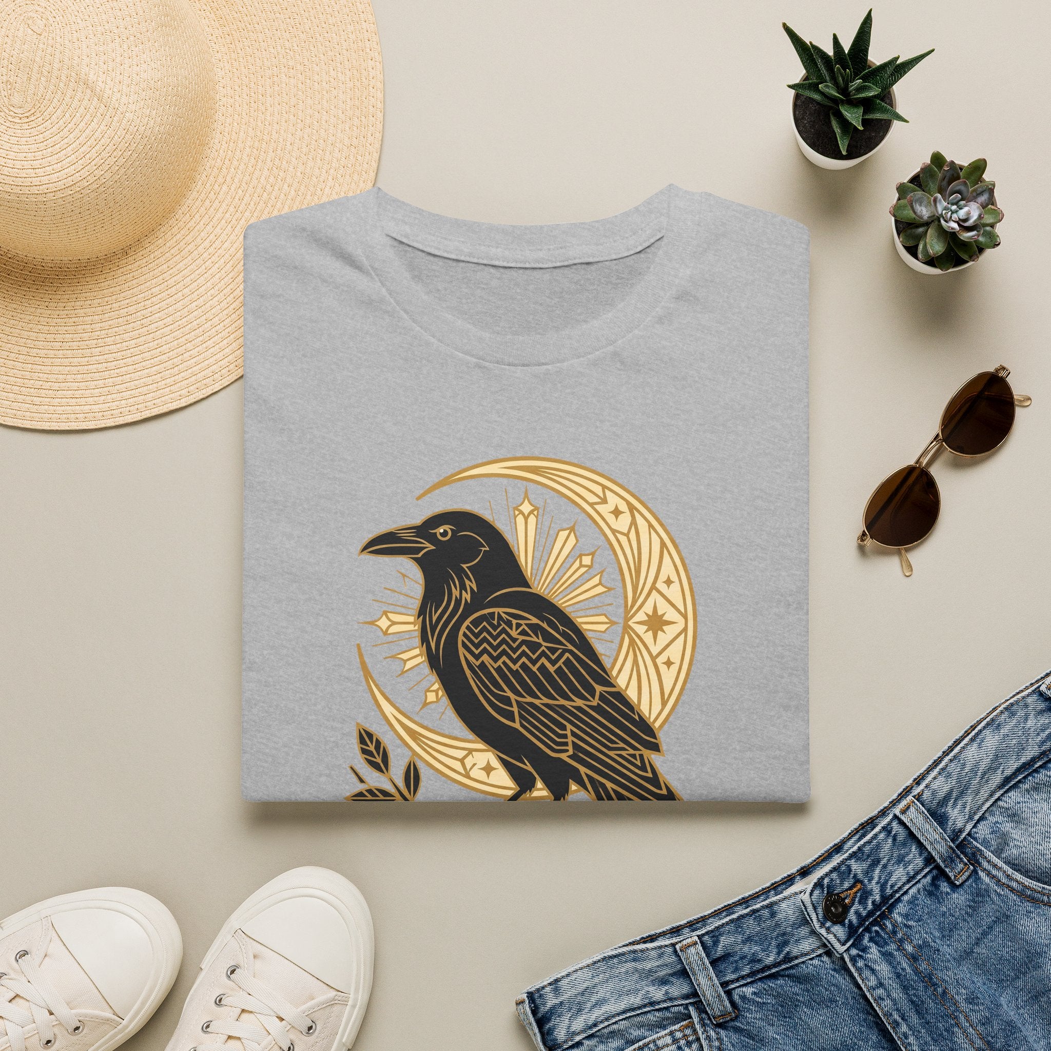 Light gray raven graphic T-shirt with gold crescent moon and Nevermore emblem