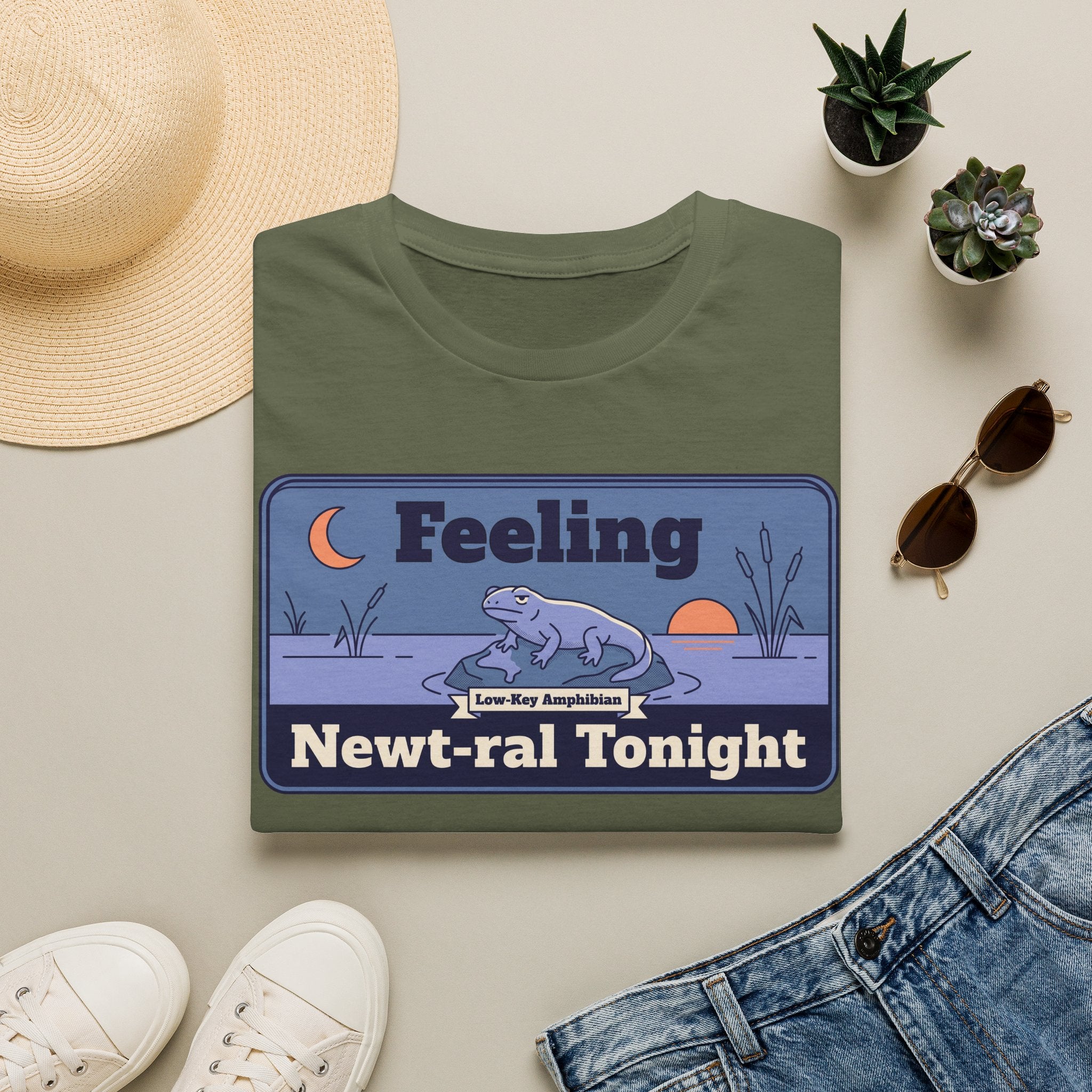 Military green T-shirt with cartoon newt and moon graphic, 'Feeling Newt-ral Tonight' text