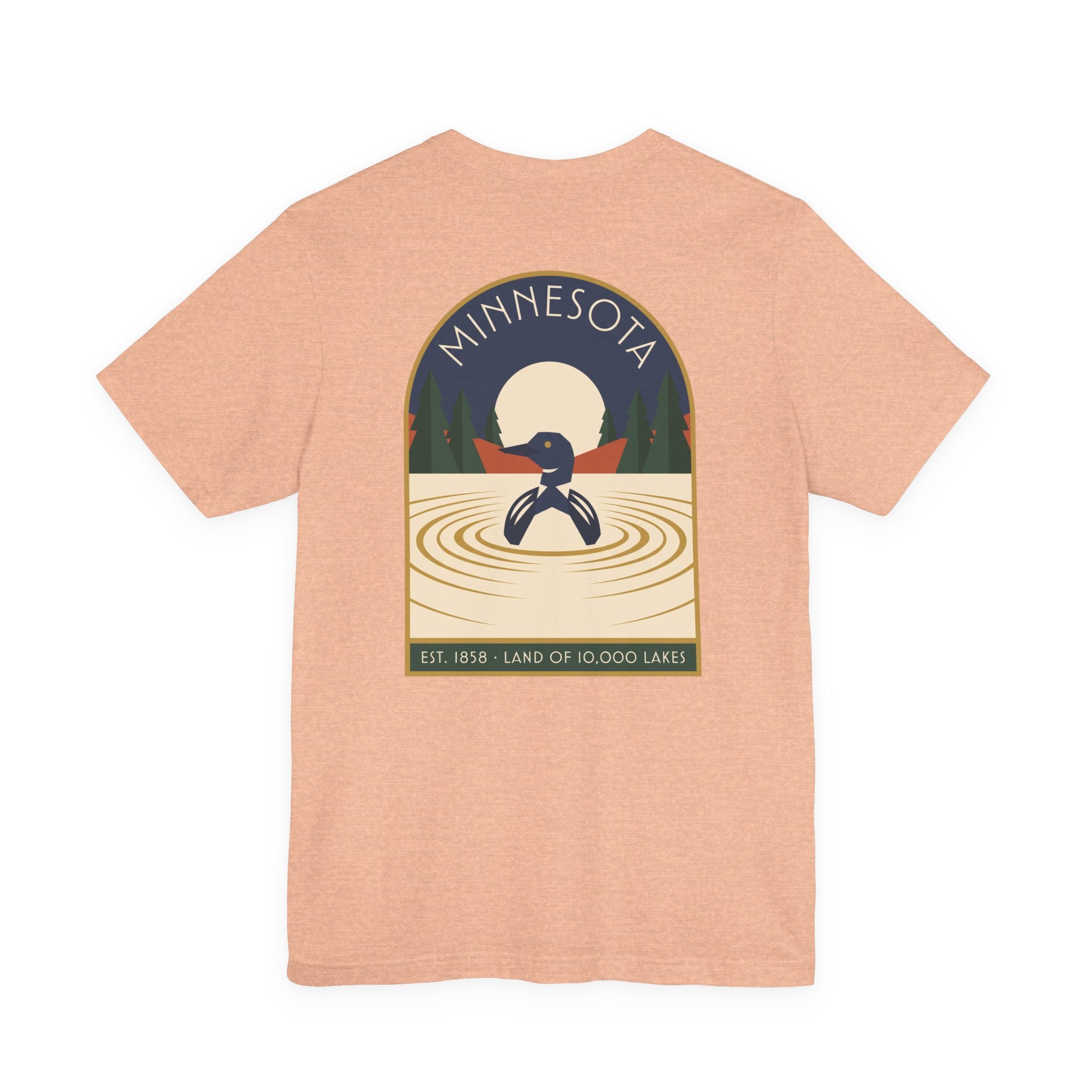 Peach art deco T-shirt with Minnesota loon lake graphic emblem on front