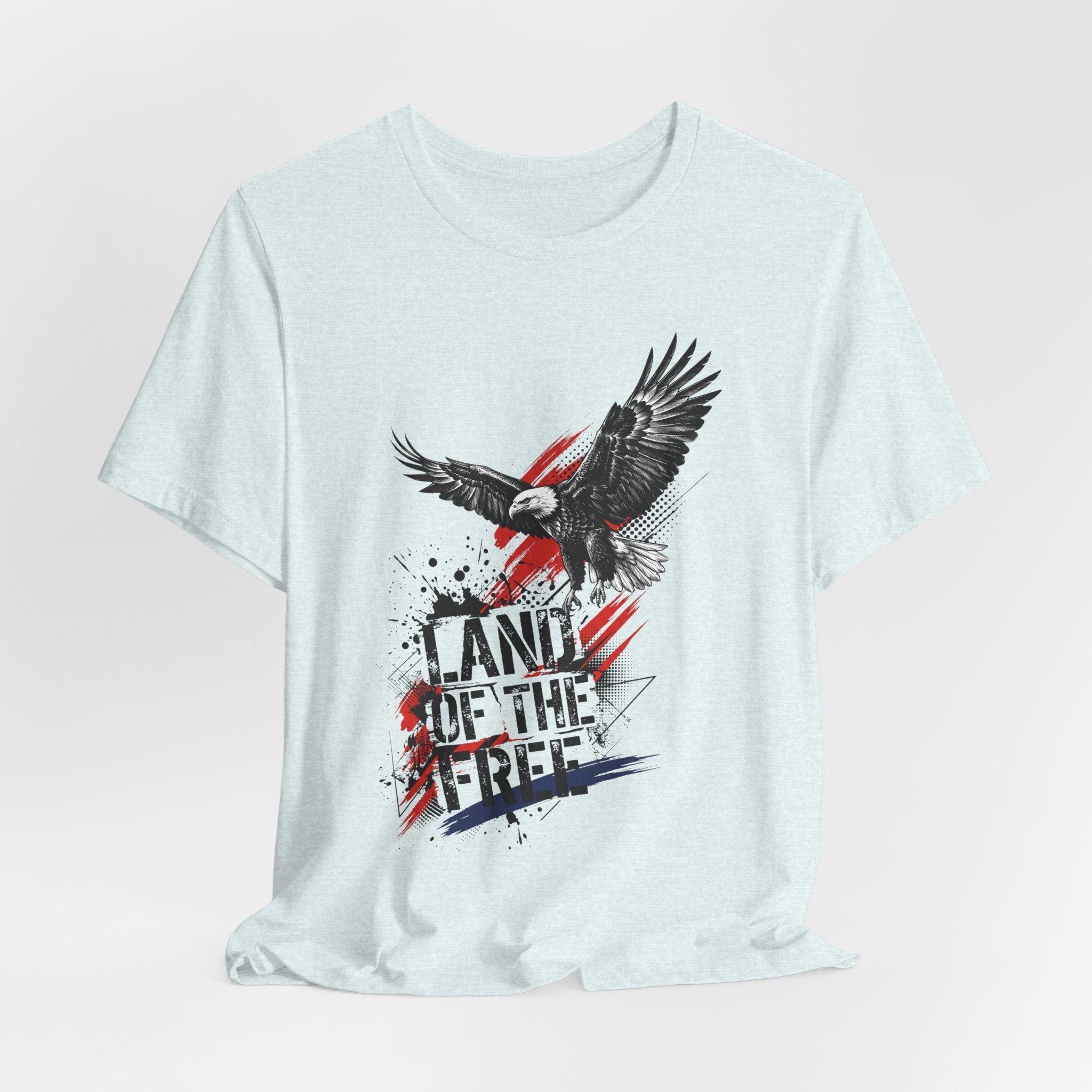 Light blue graphic t-shirt with eagle wings and "LAND OF THE FREE" distressed text print.