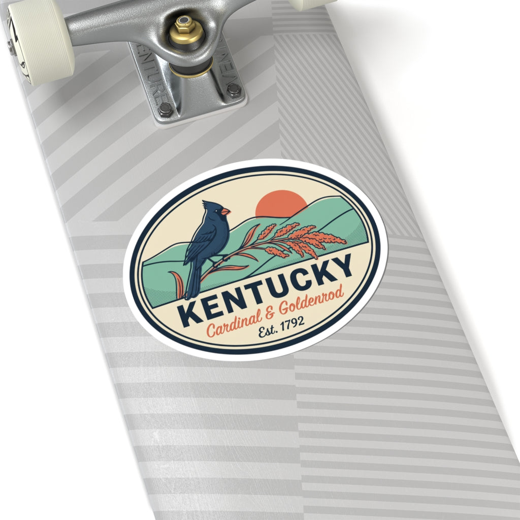 Round vinyl sticker badge with white border: blue cardinal, goldenrod blooms, Kentucky, Est. 1792.