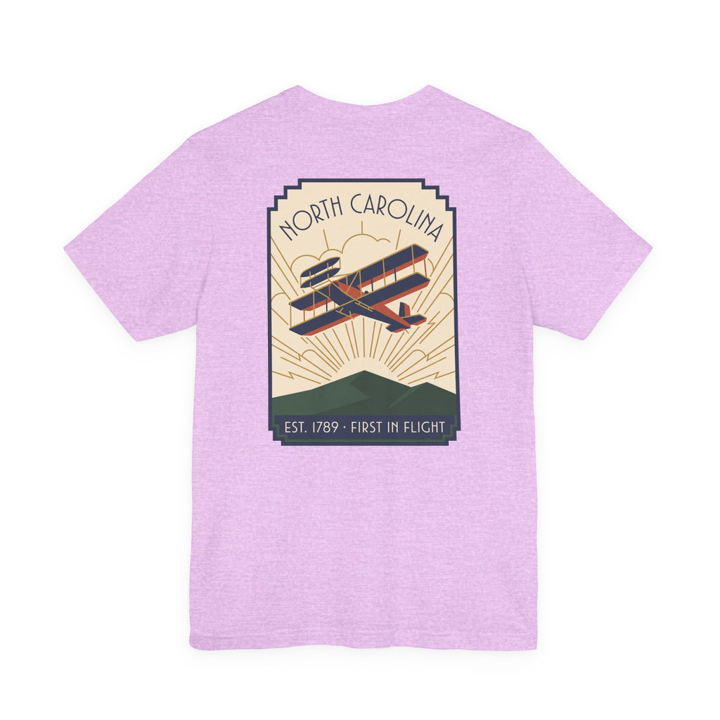 Lavender T-shirt with large North Carolina biplane graphic on the back