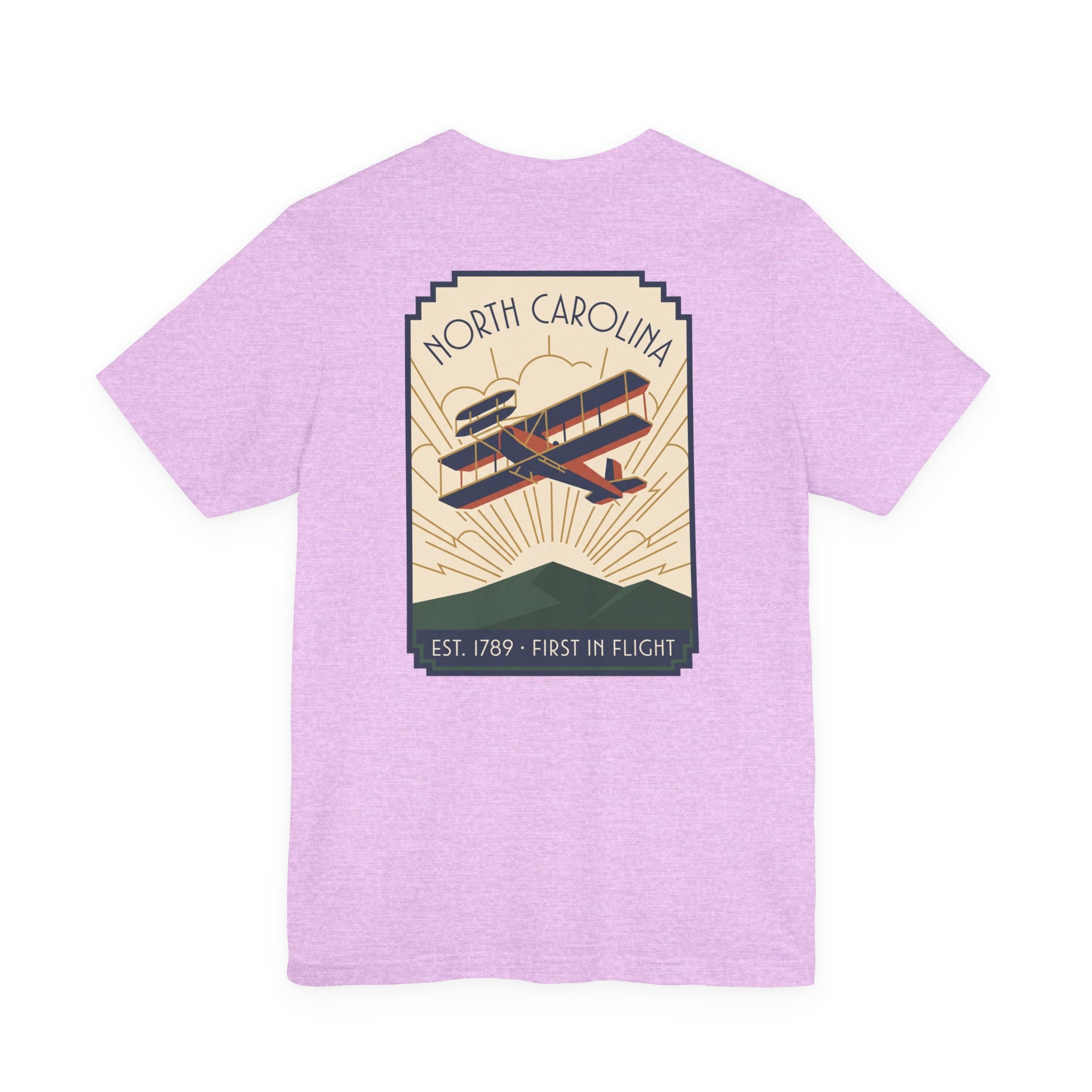 Lavender T-shirt with large North Carolina biplane graphic on the back