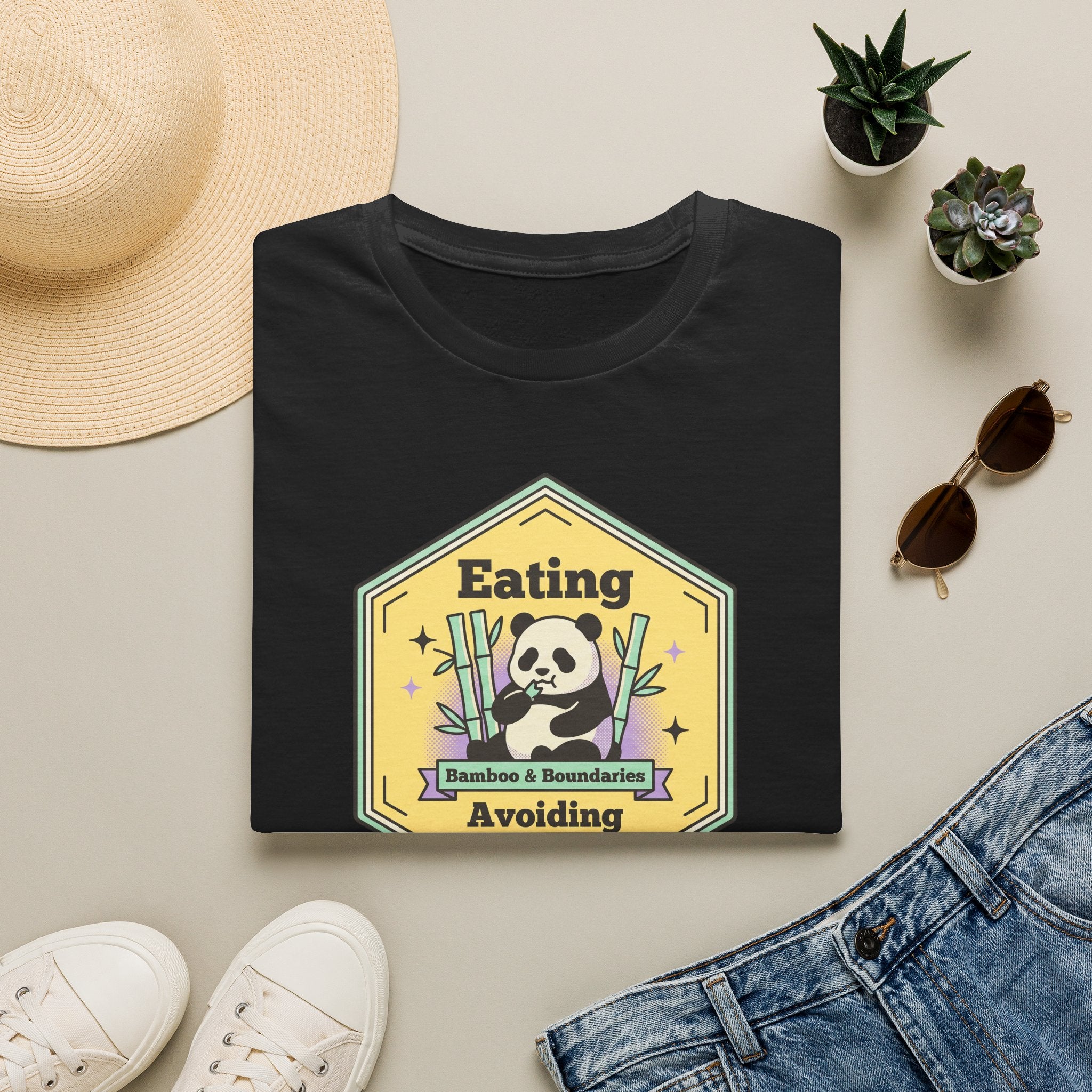 Unisex softstyle T-shirt, black, panda badge graphic on front