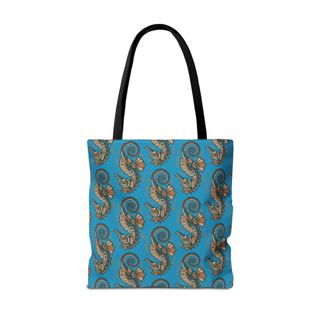 Tote bag front view in blue with all-over seahorse pattern and black handles