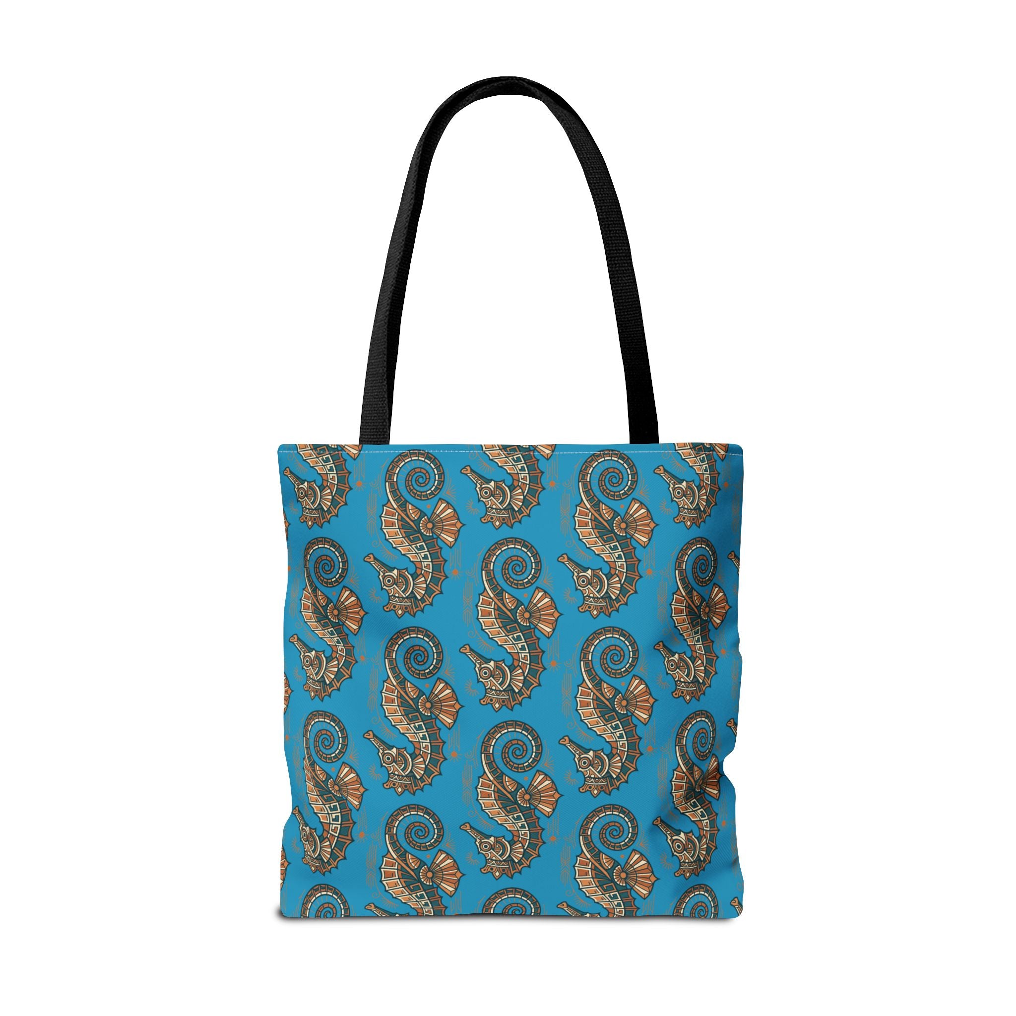 Tote bag front view in blue with all-over seahorse pattern and black handles