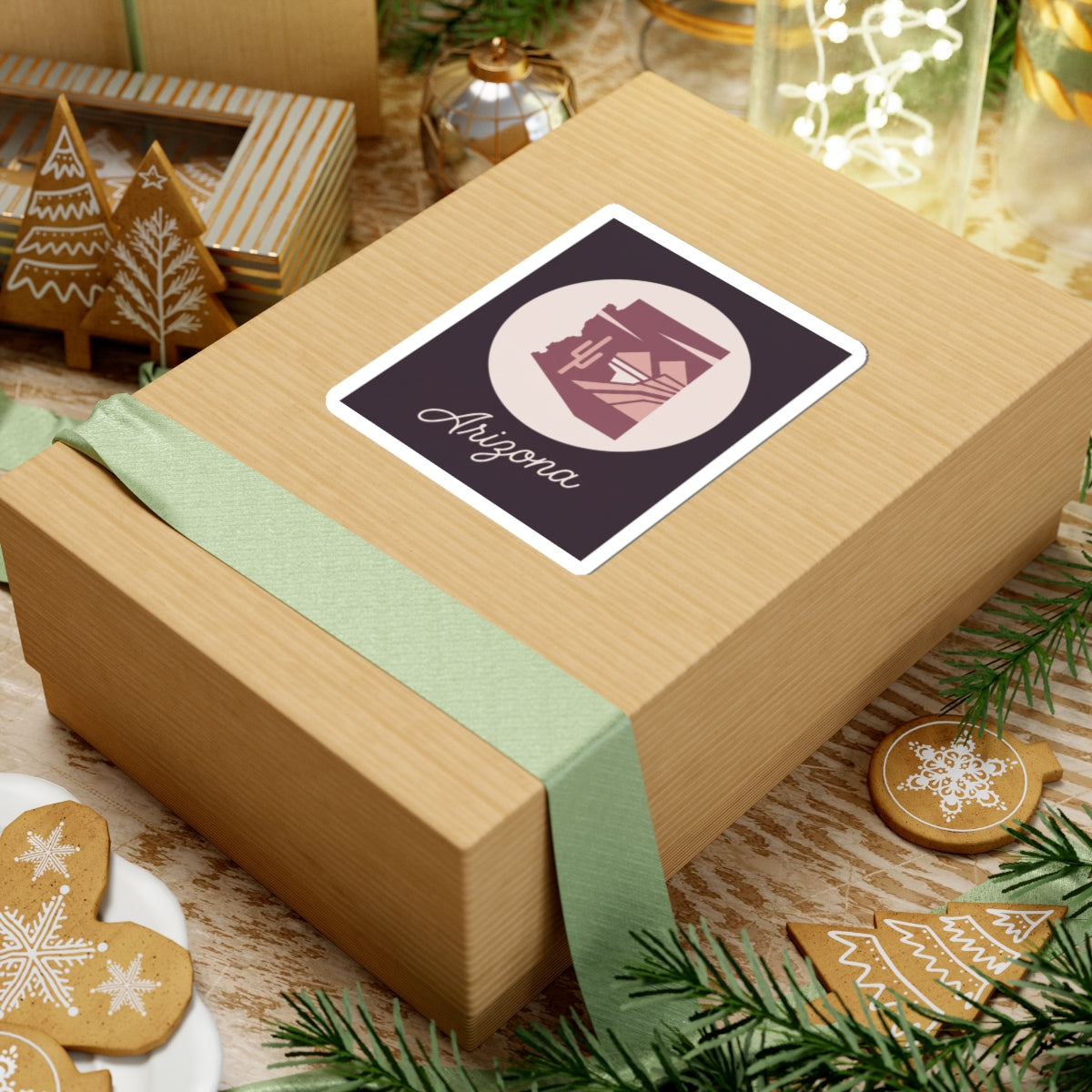 Mauve Arizona state silhouette vinyl sticker on gift box with cream circle and 'Arizona' script