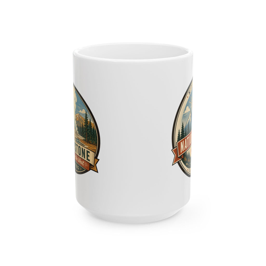 White ceramic mug with Yellowstone-style side badges and landscape artwork, no handle