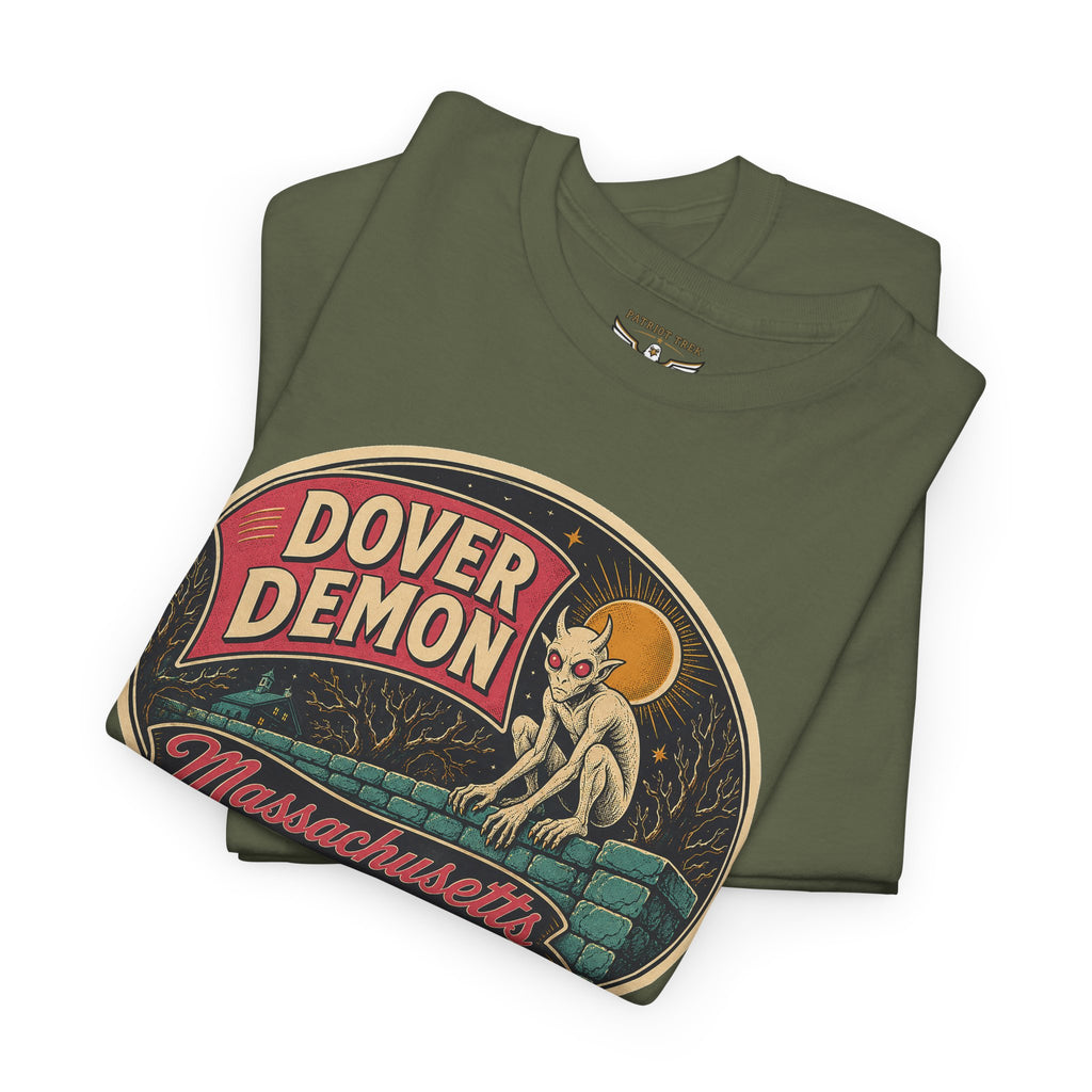 Military green graphic tee with large circular Dover Demon Massachusetts artwork on front