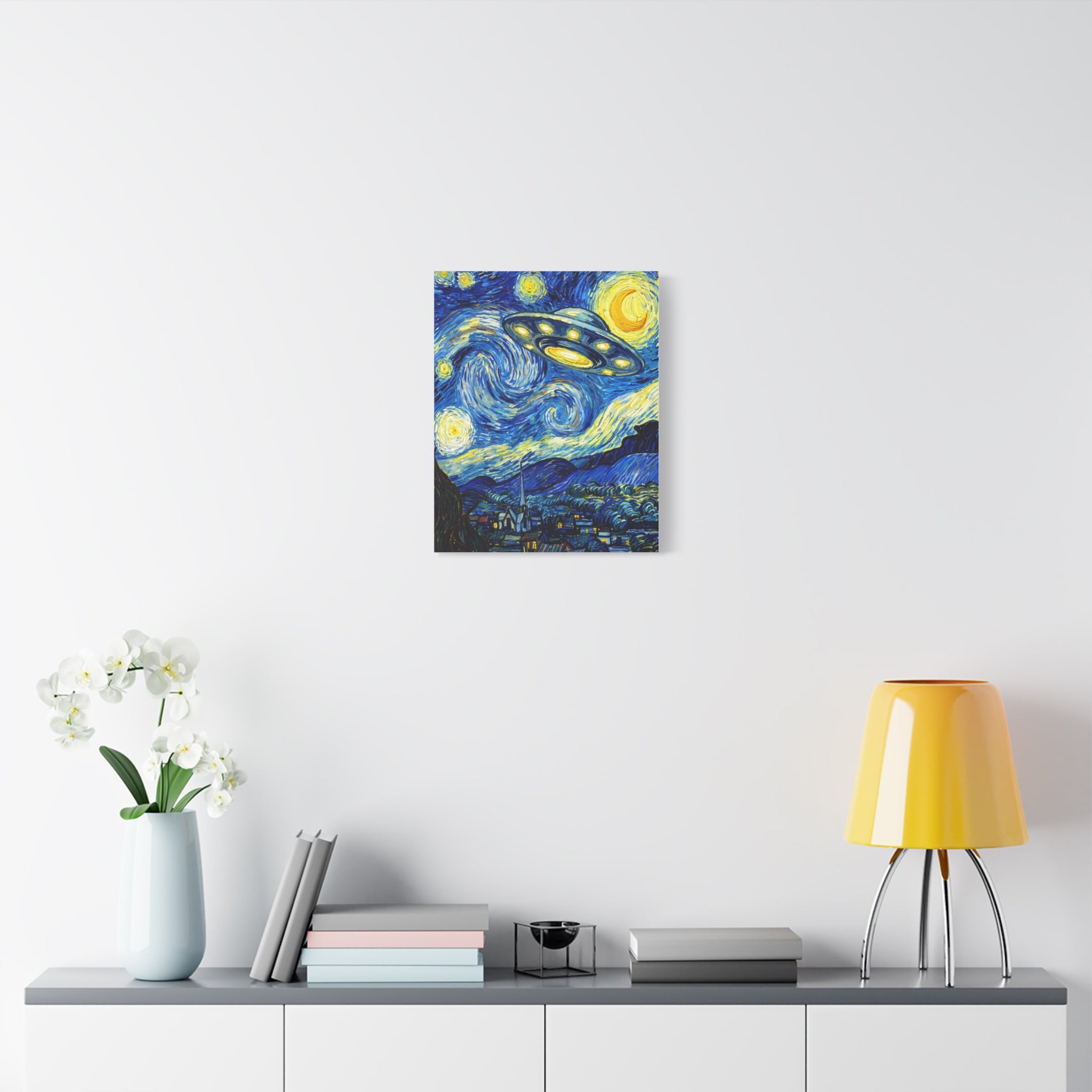 Blue-and-yellow starry UFO matte stretched canvas, centered on light wall