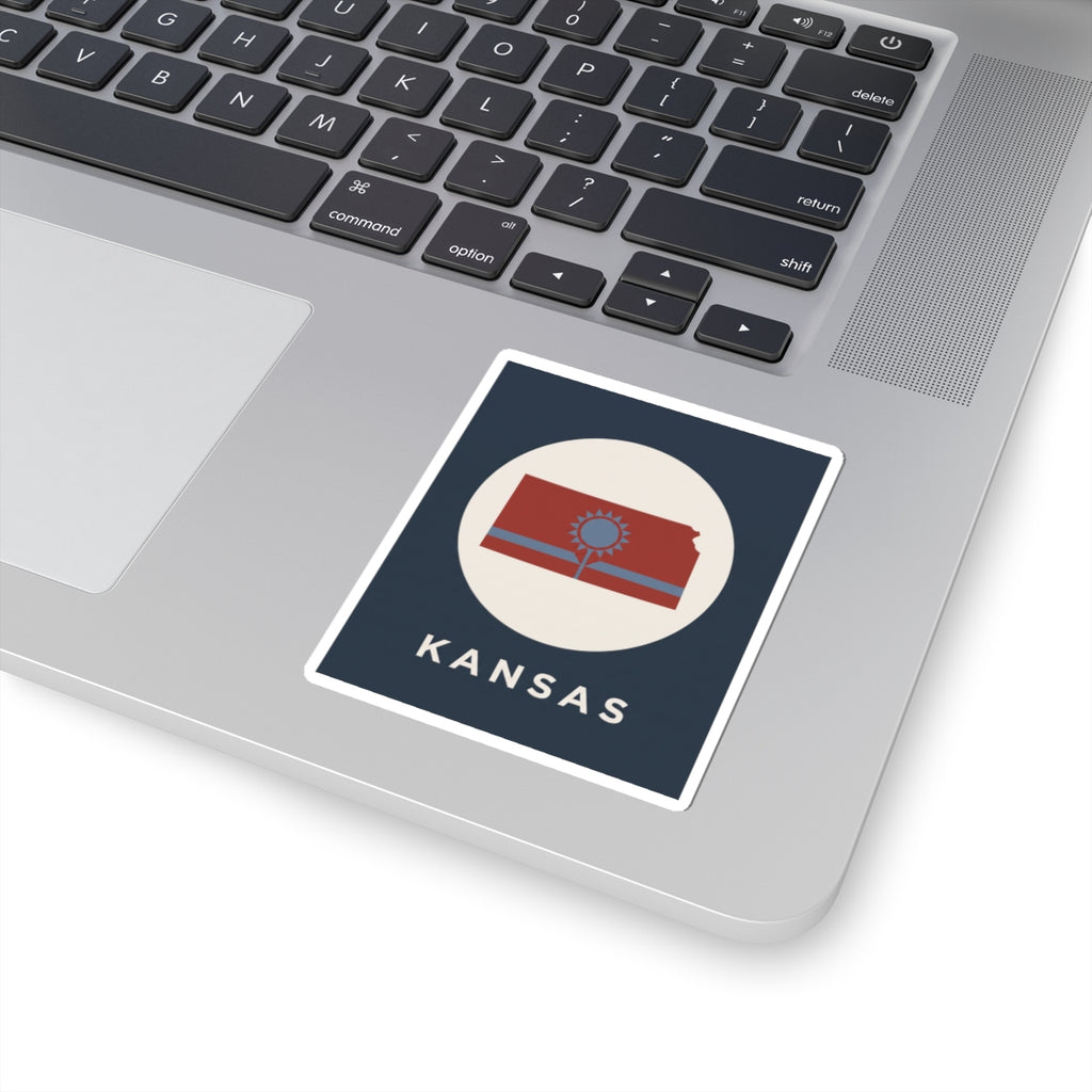 Rectangular Kansas sunflower state sticker, blue background, “KANSAS” text under emblem