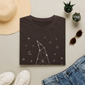 Dark brown witch constellation graphic T-shirt with star and moon symbols