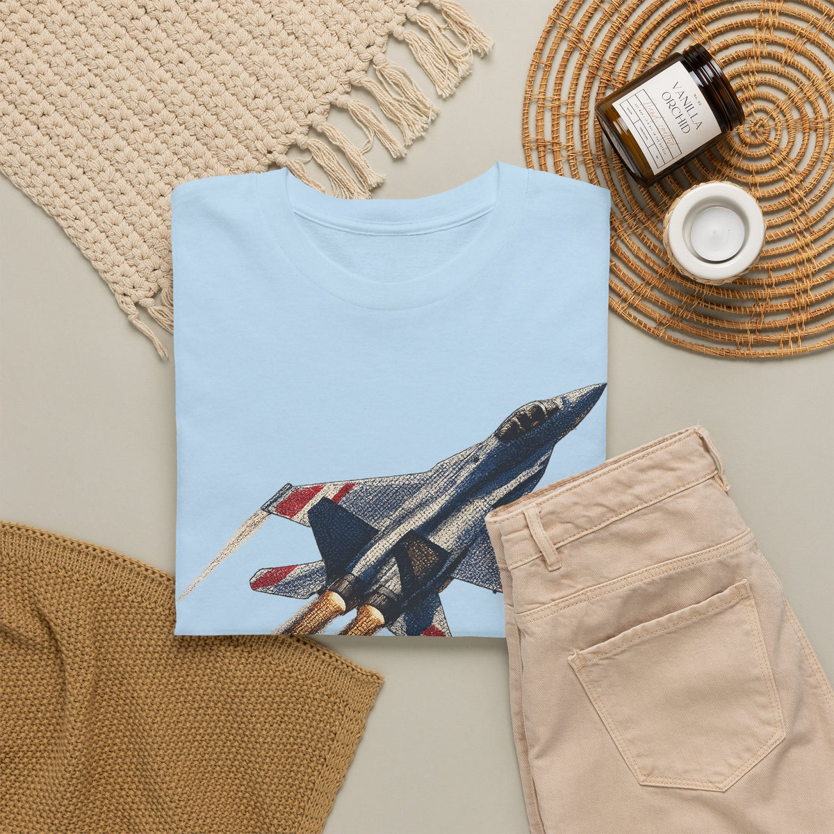 Light blue T-shirt front with fighter jet graphic and crew neck, short sleeves