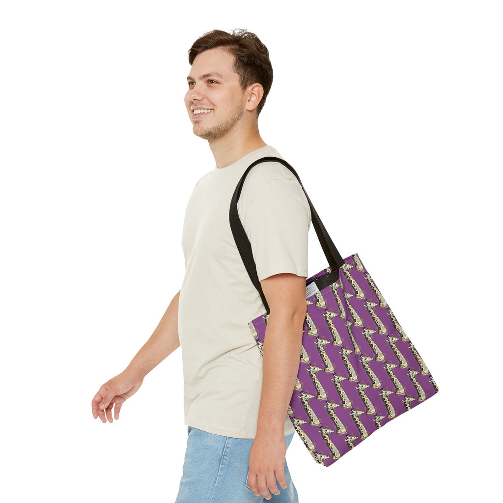 Purple tote bag with saxophone pattern, worn on shoulder with black strap
