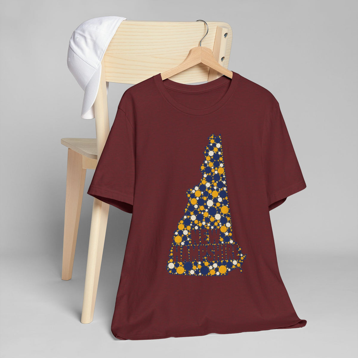 Burgundy crewneck T-shirt with New Hampshire floral graphic