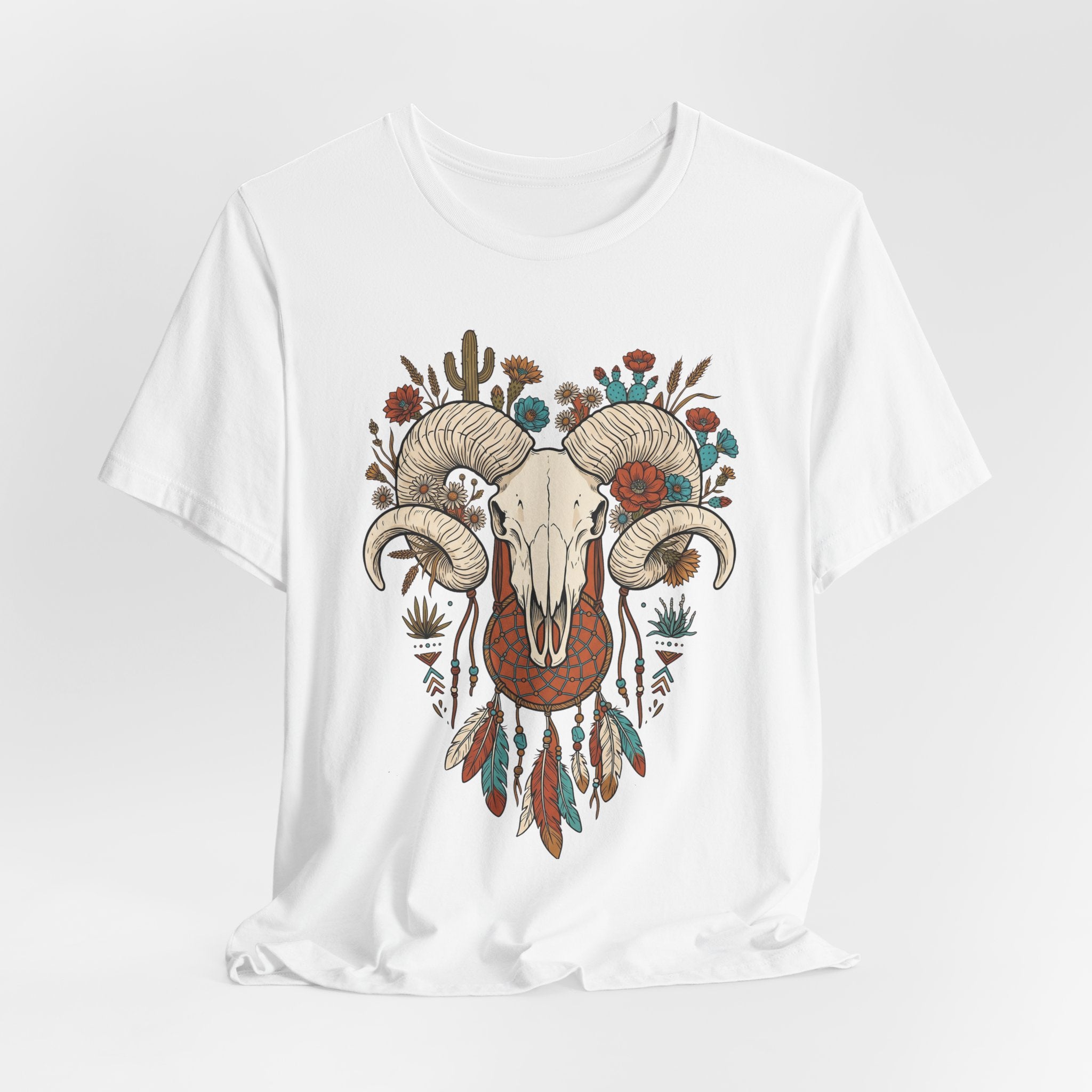 White front graphic ram skull with curled horns, flowers, dreamcatcher feathers, cactus accents