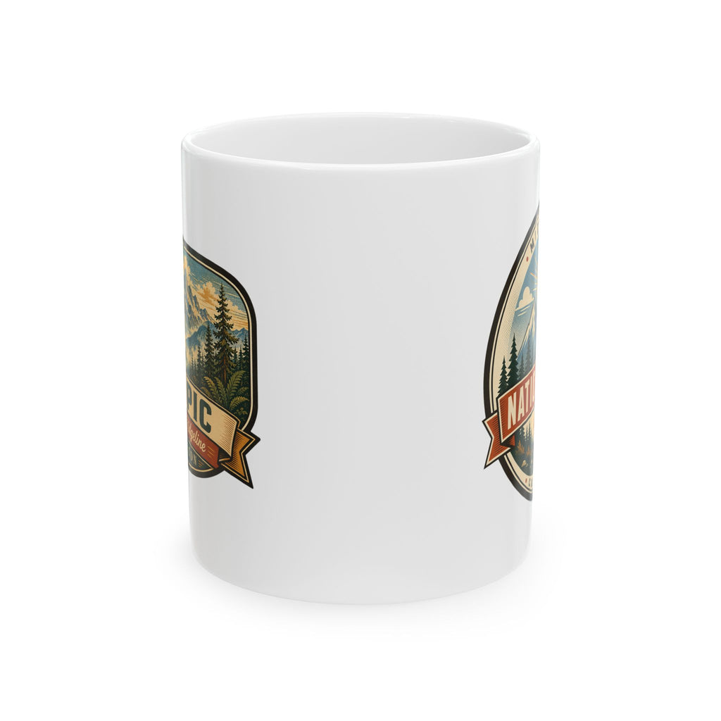 White ceramic coffee mug with partial vintage national park badge graphics on sides