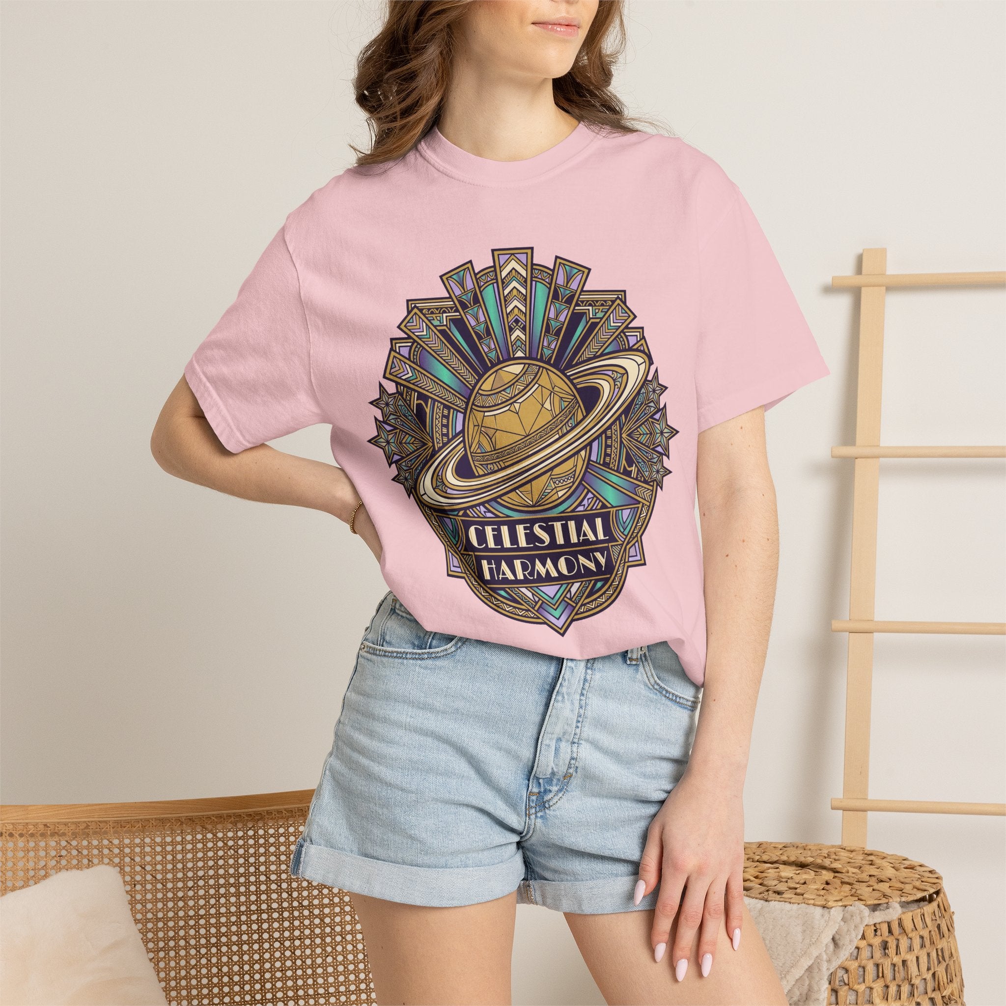 Light pink T-shirt with Saturn ring celestial graphic, worn by model