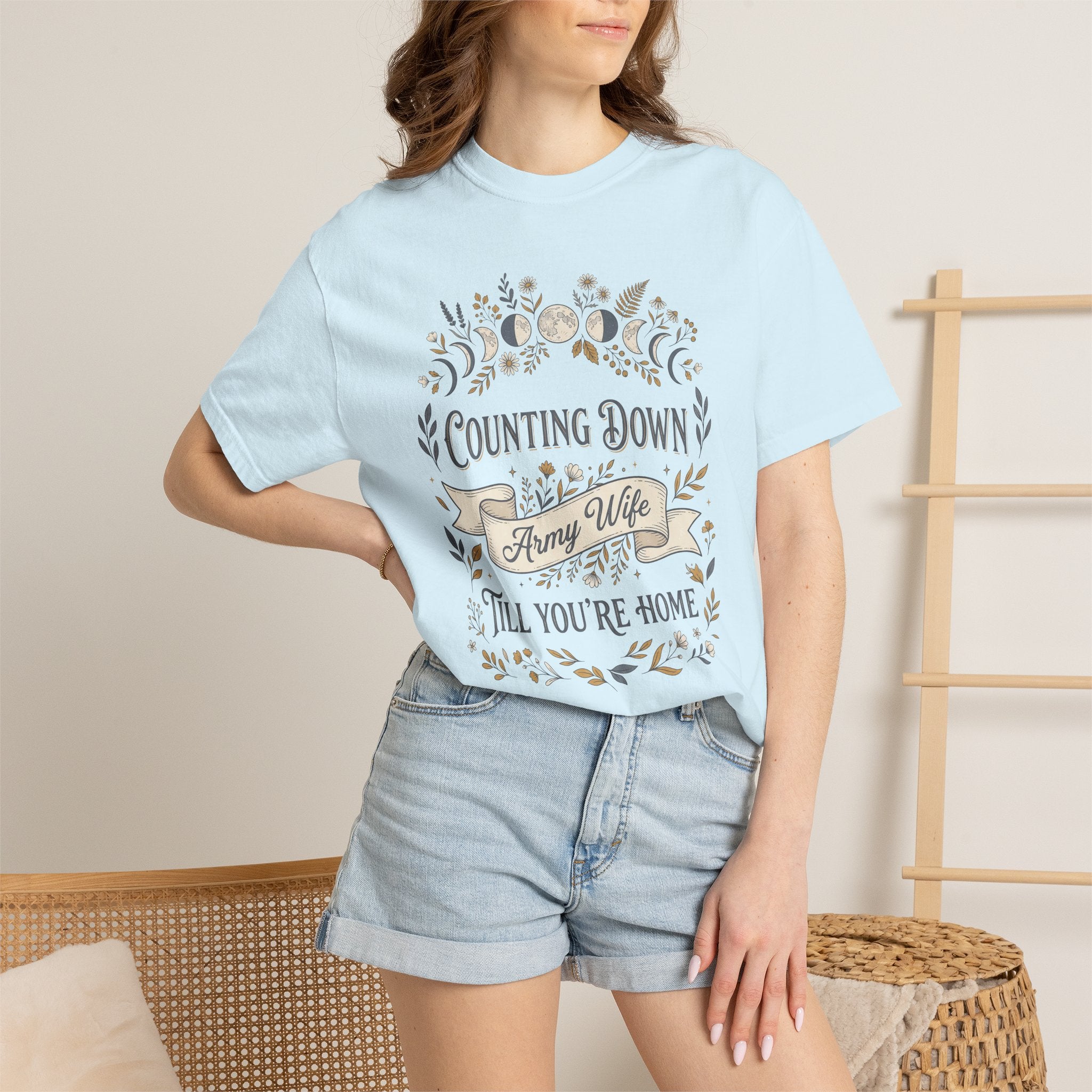 Light blue crewneck t-shirt with floral countdown graphic on the front