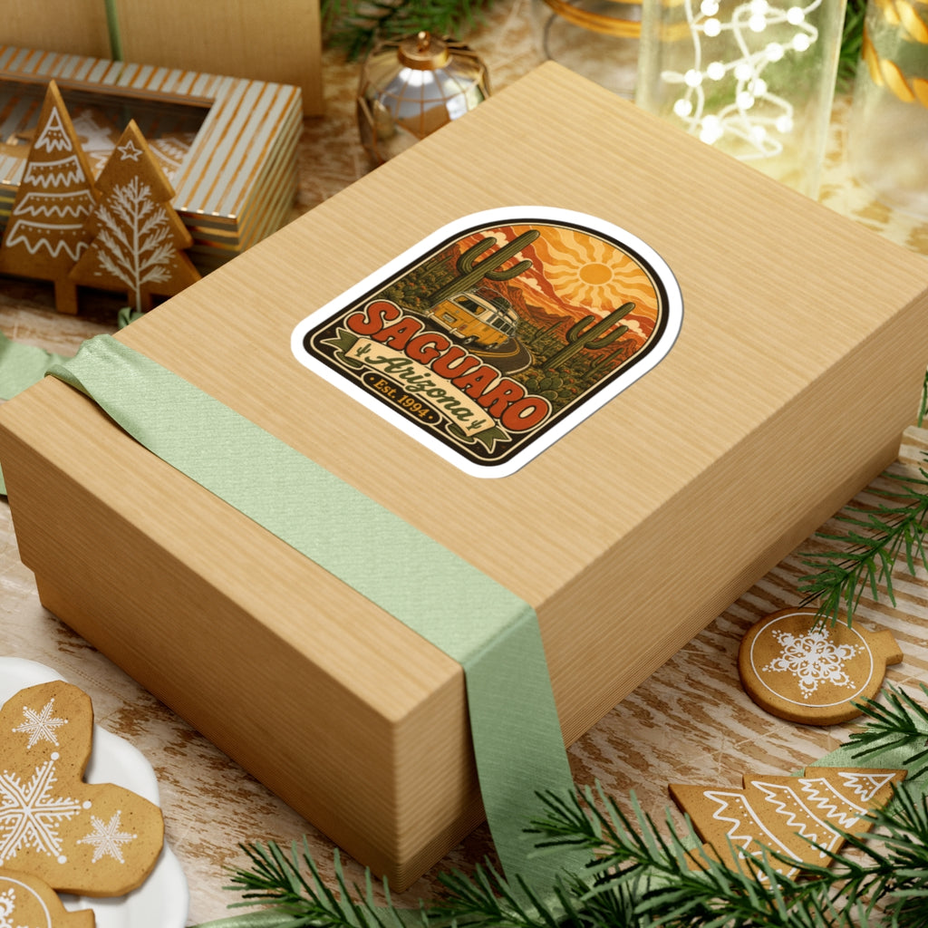 Saguaro Arizona kiss-cut sticker on a wrapped gift box, cactus scene and Est. 1994
