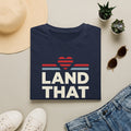 Navy crewneck unisex T-shirt with retro heart graphic and 'LAND THAT' print